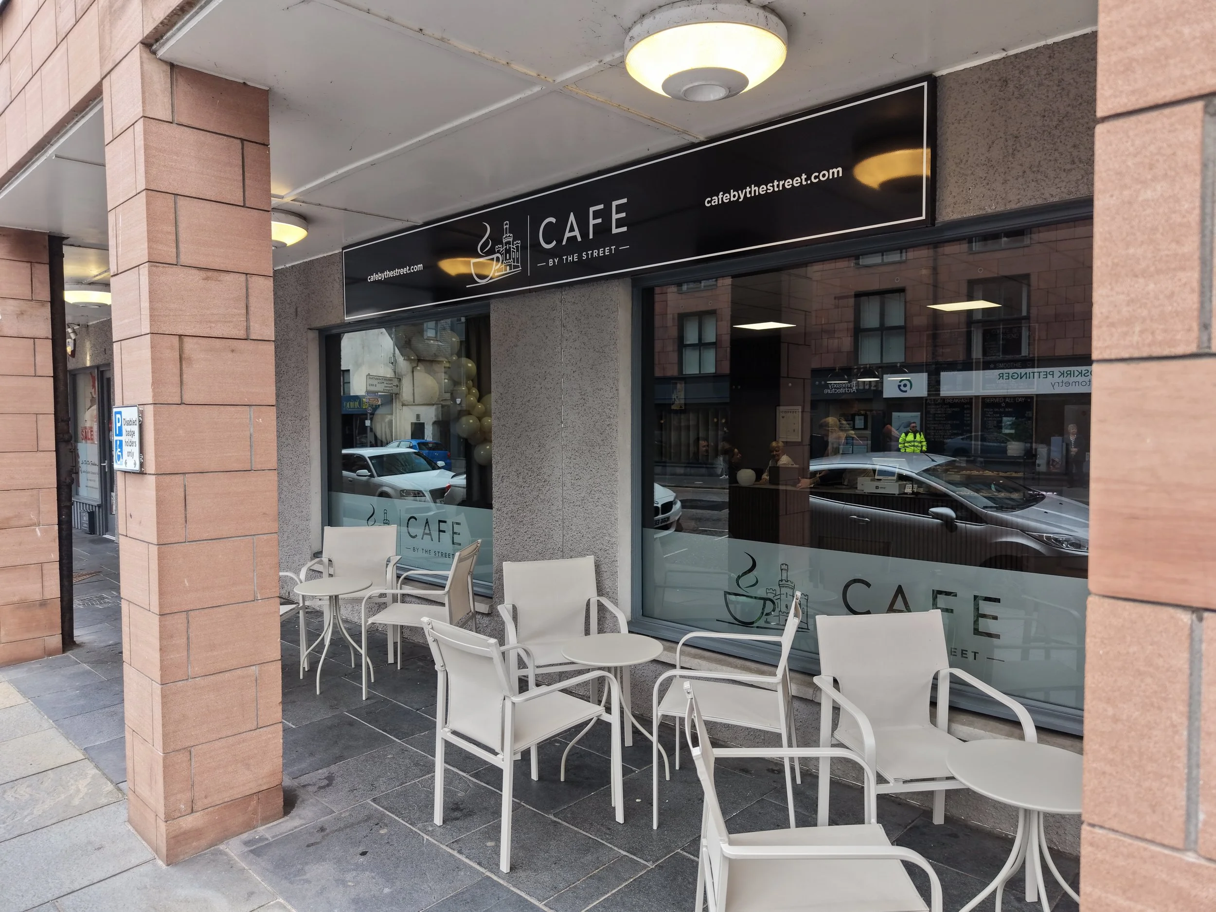 The outdoor seating area at the newly opened Café by the Street