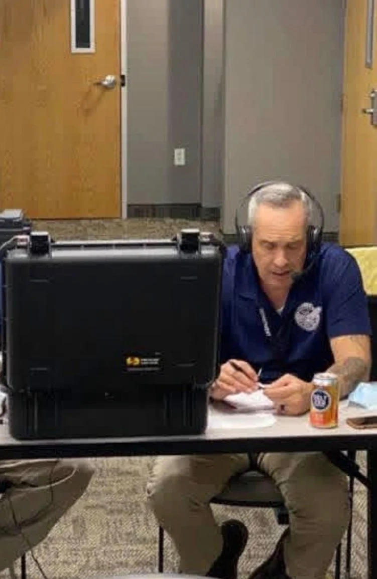Rich Rodriguez serving as Crisis Negotiations Team Leader with headset