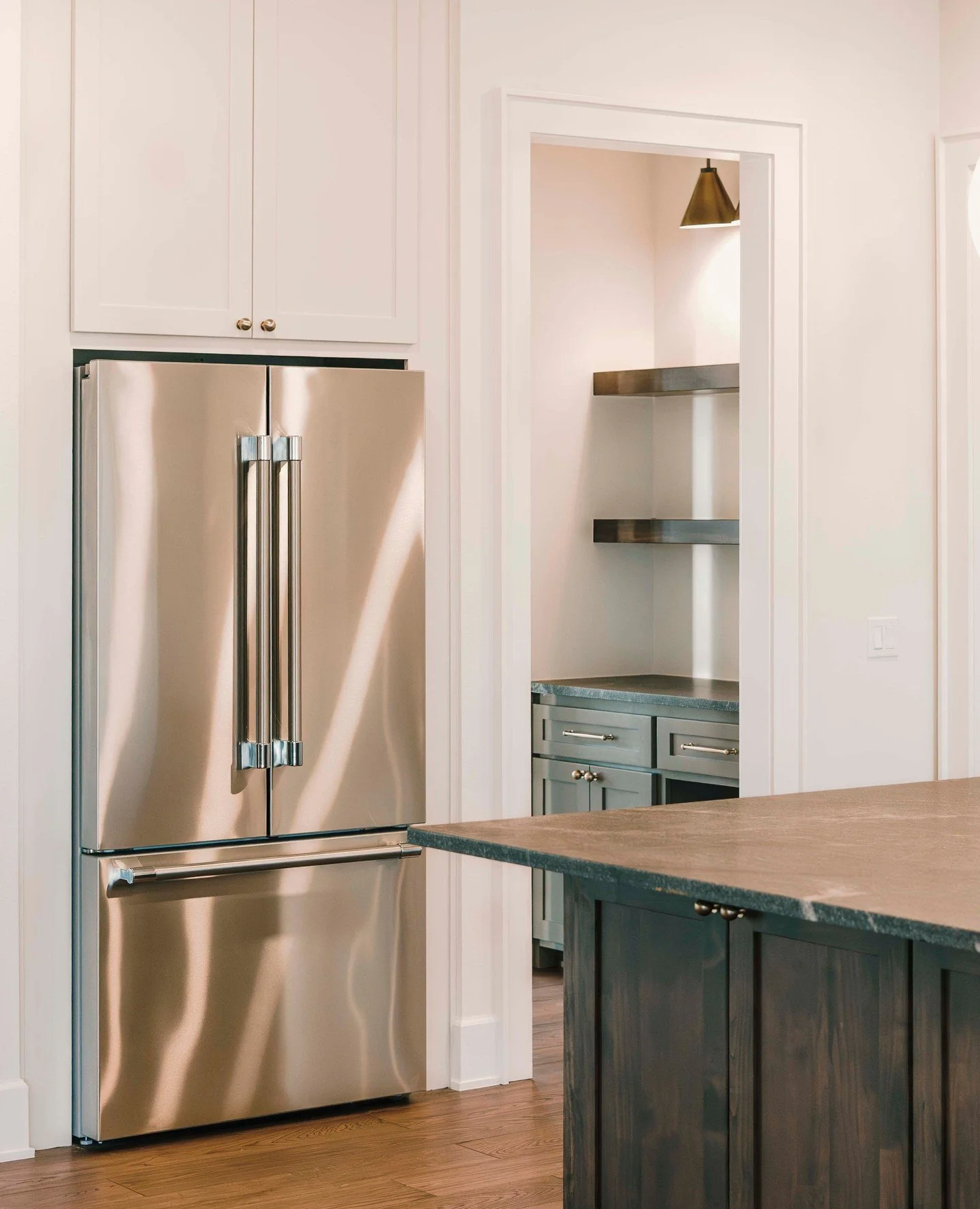The best kitchens have a little something hiding around every corner.⁠
Built-in pantry storage, custom cabinetry, and the kind of layout that actually makes sense for the way you live. Every detail in a Monument home is designed with purpose &mdash; 