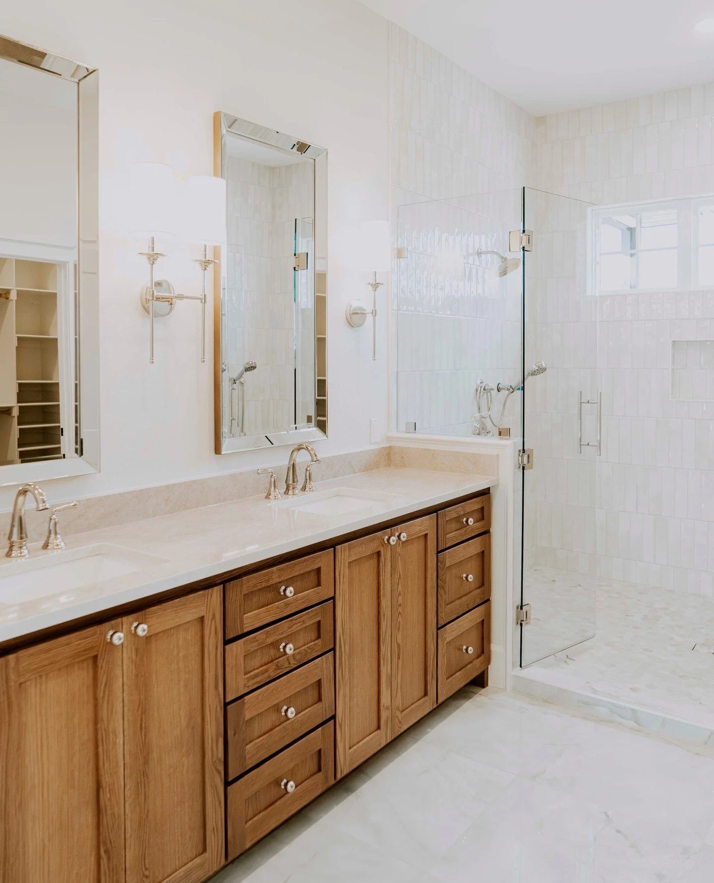 The details make the difference. ✨⁠
⁠
Warm oak cabinetry. Marble countertops. A frameless glass shower and stone floors that run wall to wall. This primary bath was designed to feel like a retreat &mdash; and built to perform like one too.⁠
⁠
Buildin