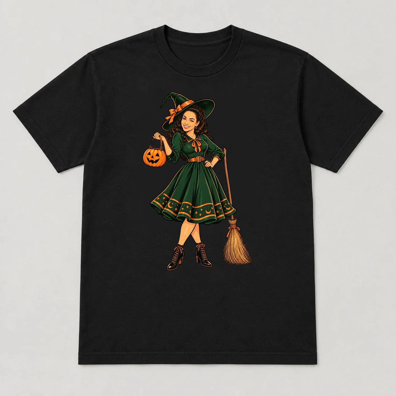 Hex Appeal: a winking witch with her jack-o’-lantern and broom, illustration by Maite Hollenbeck (Tee, Black)