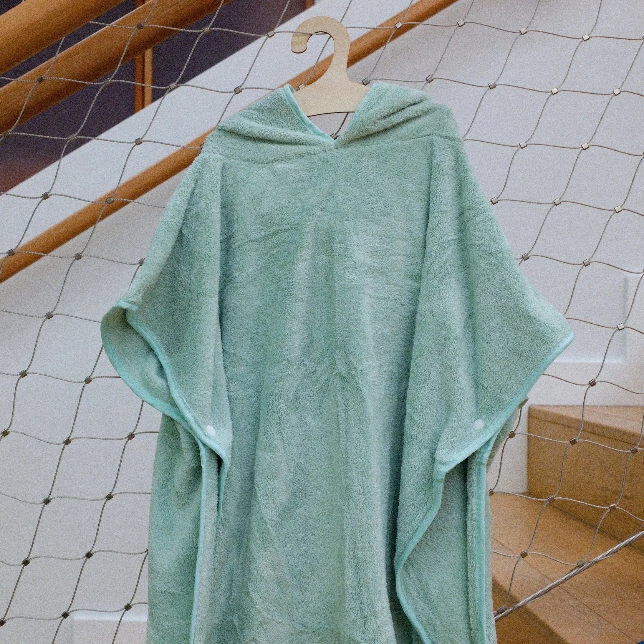custom kids bath robe [front]. Gifted to consumers, paid partners + employees.