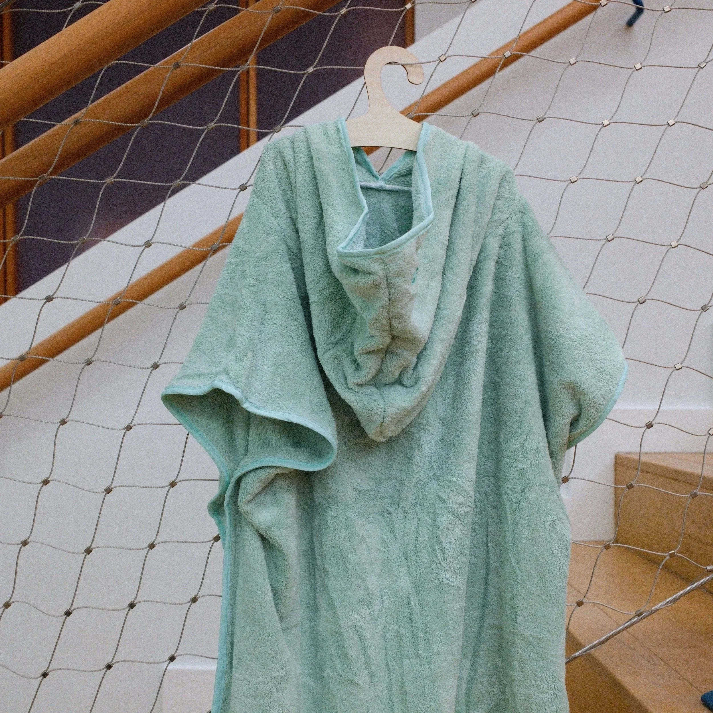 custom kids bath robe [back]. Gifted to consumers, paid partners + employees.