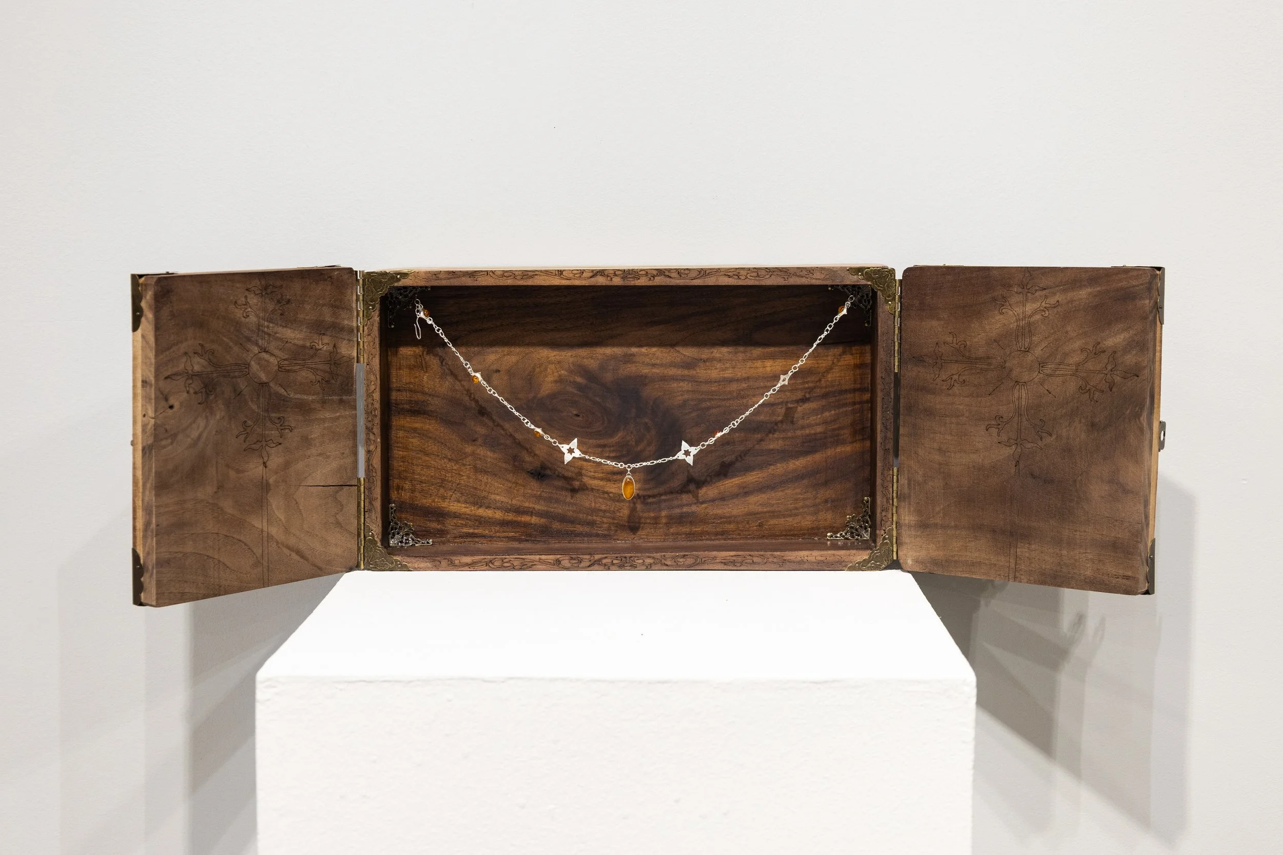 “Medine Saule” or “Wooden Sun”**
Sterling Silver, Amber, Black Walnut**
18” x 12” x 2” and 15” x .5”**
2026

