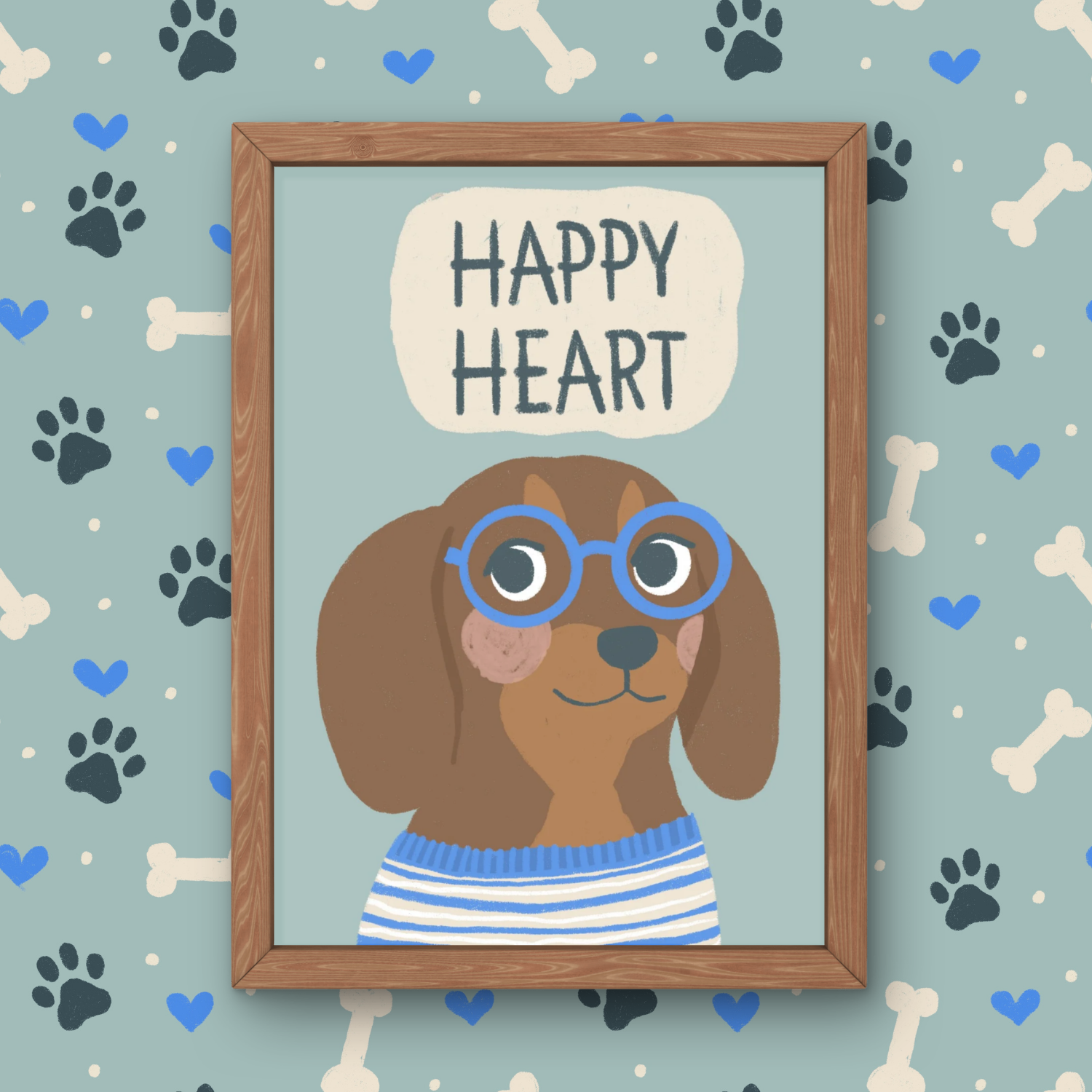 A framed illustration of a cute dog wearing blue glasses and a striped blue and white sweater, with a speech bubble above saying "Happy Heart." The background is decorated with paw prints, hearts, and bones pattern in blue, black, and white.