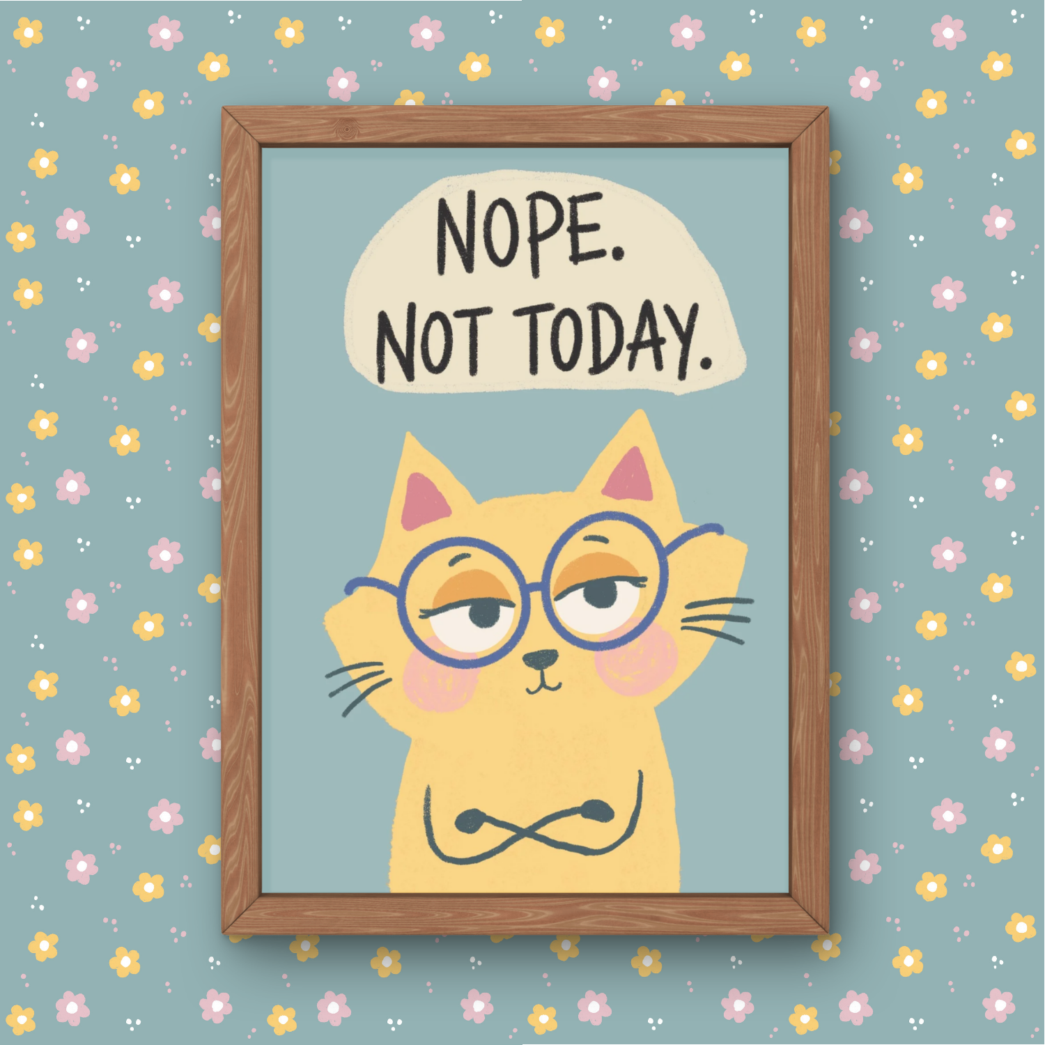 A framed illustration of a yellow cat with pink cheeks, wearing round glasses, and with its arms crossed. Above the cat, there is a speech bubble with the text "NOPE. NOT TODAY." The background is light blue with a pattern of pink, yellow, and white flowers and small dots.