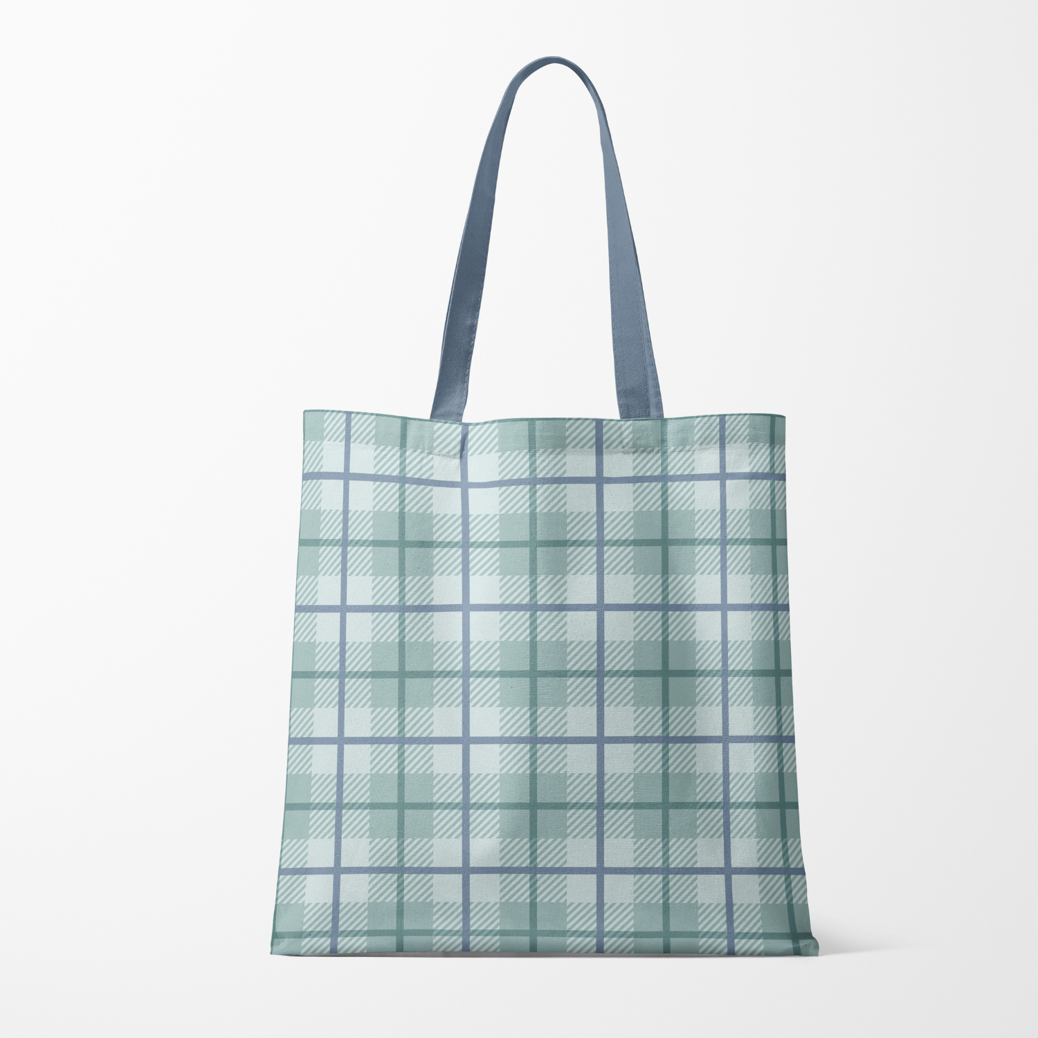 A blue and green checkered tote bag with blue handles on a white background.