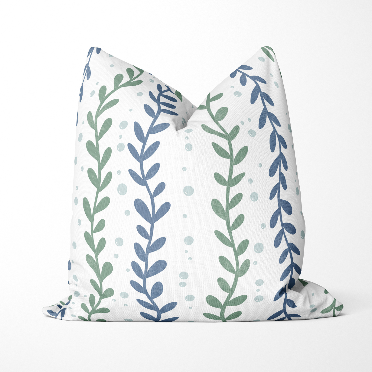 Decorative white pillow with green and blue leafy vine pattern