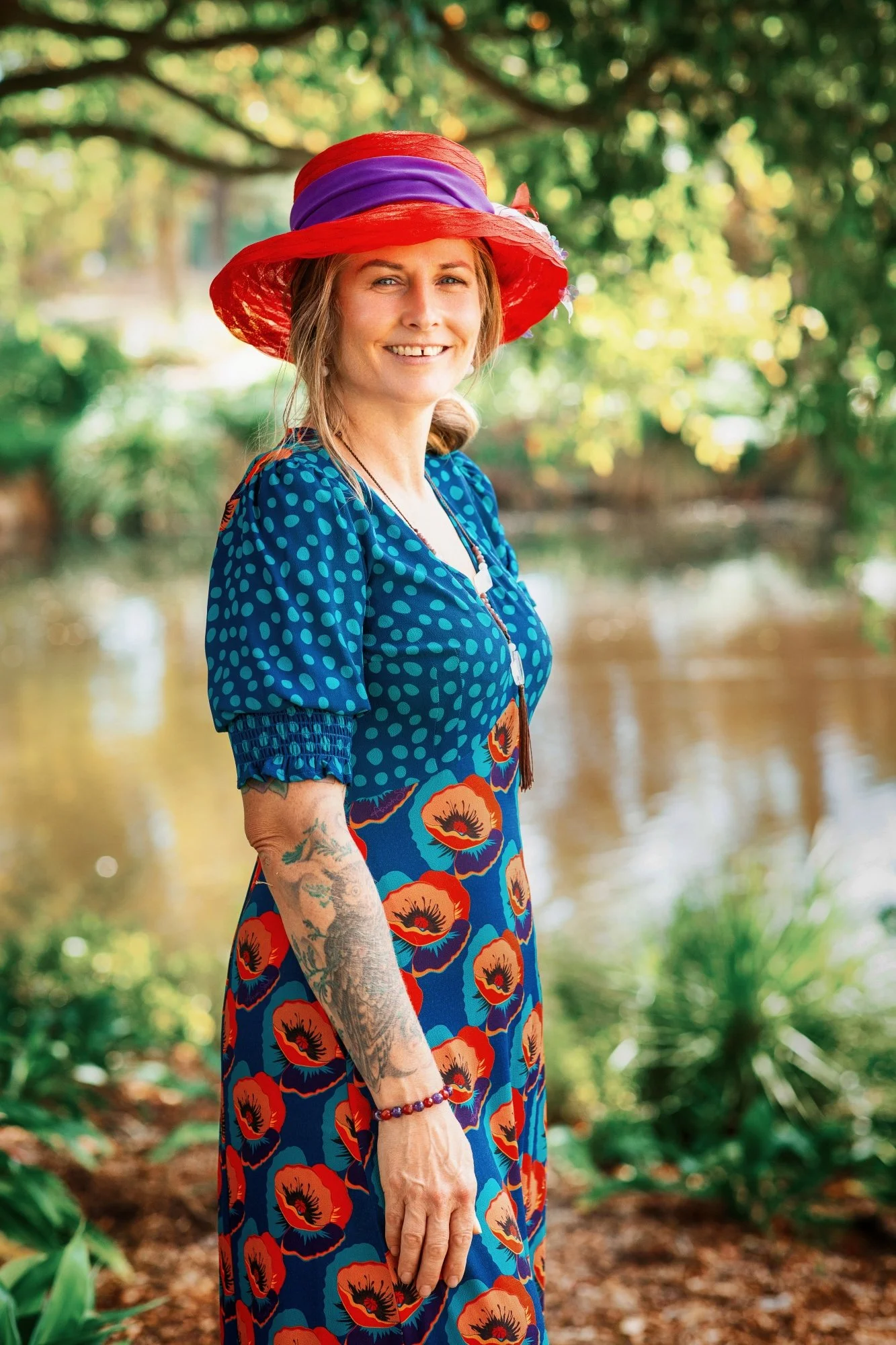 Olivia standing by a pond.jpg