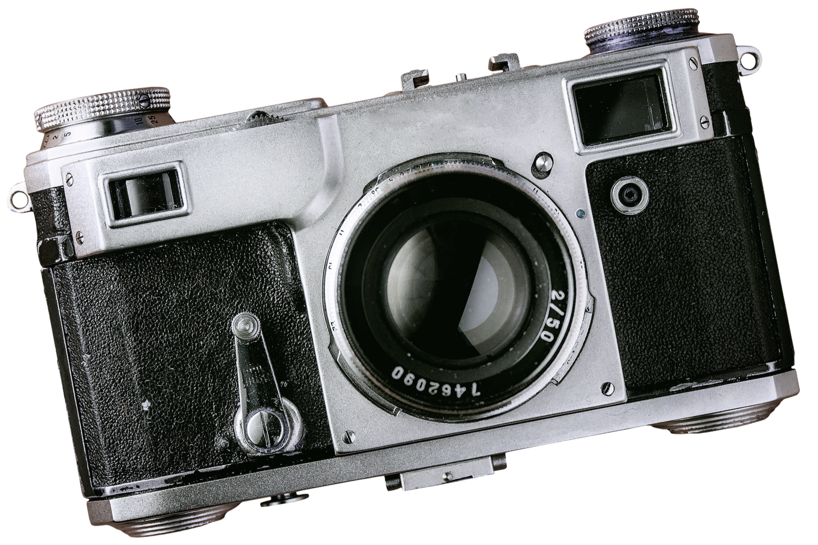 An old vintage camera with a black leather grip, silver body, and manual controls, isolated on a black background.