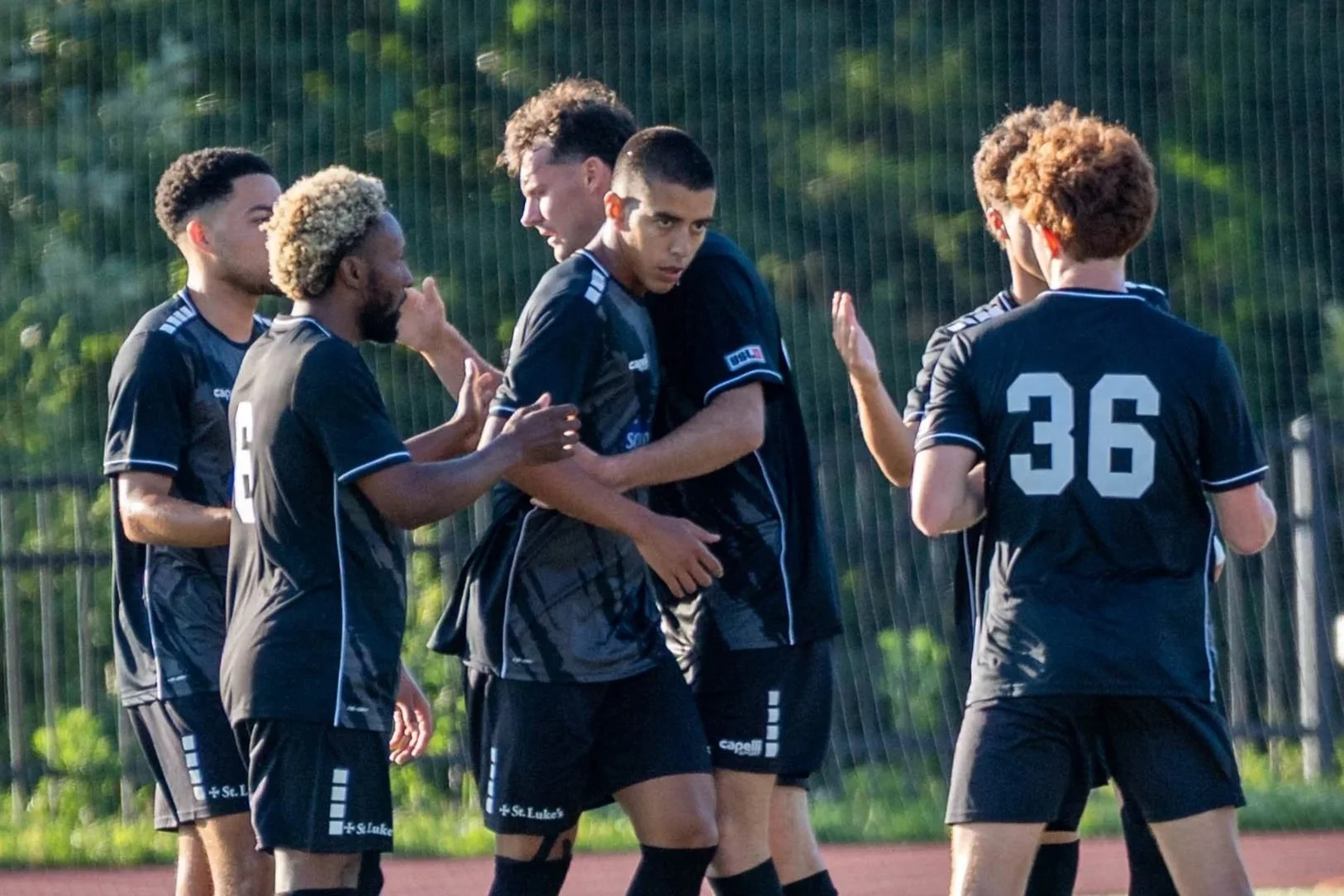 FC Ambush celebrating after scoring a goal against Sunflower State FC at Spartan Field on June 13th, 2026