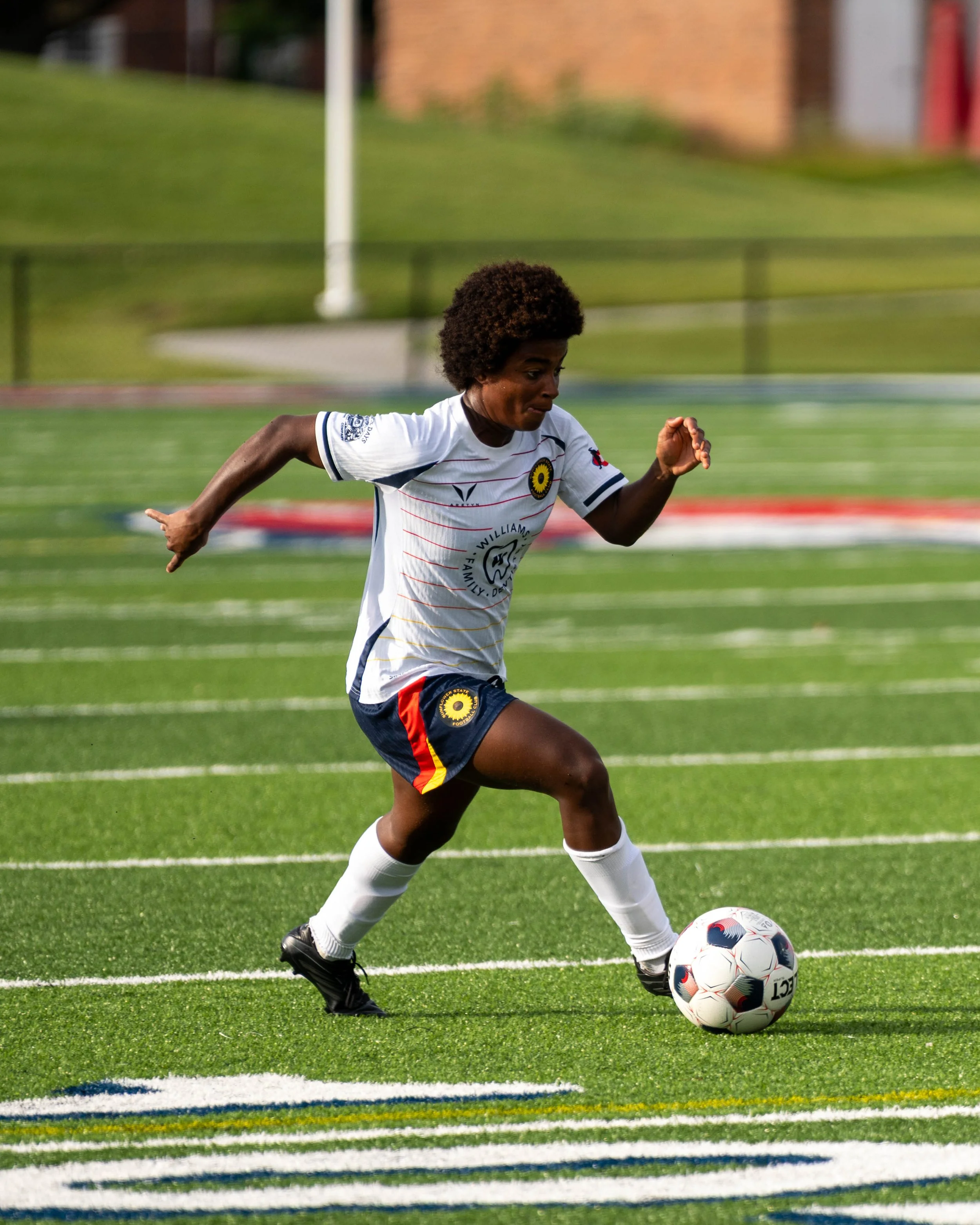 Sunflower State FC's Tata (#10) dribbles with the ball at home vs Wichita FC on June 7th, 2026 - Photo by Austin Farrow