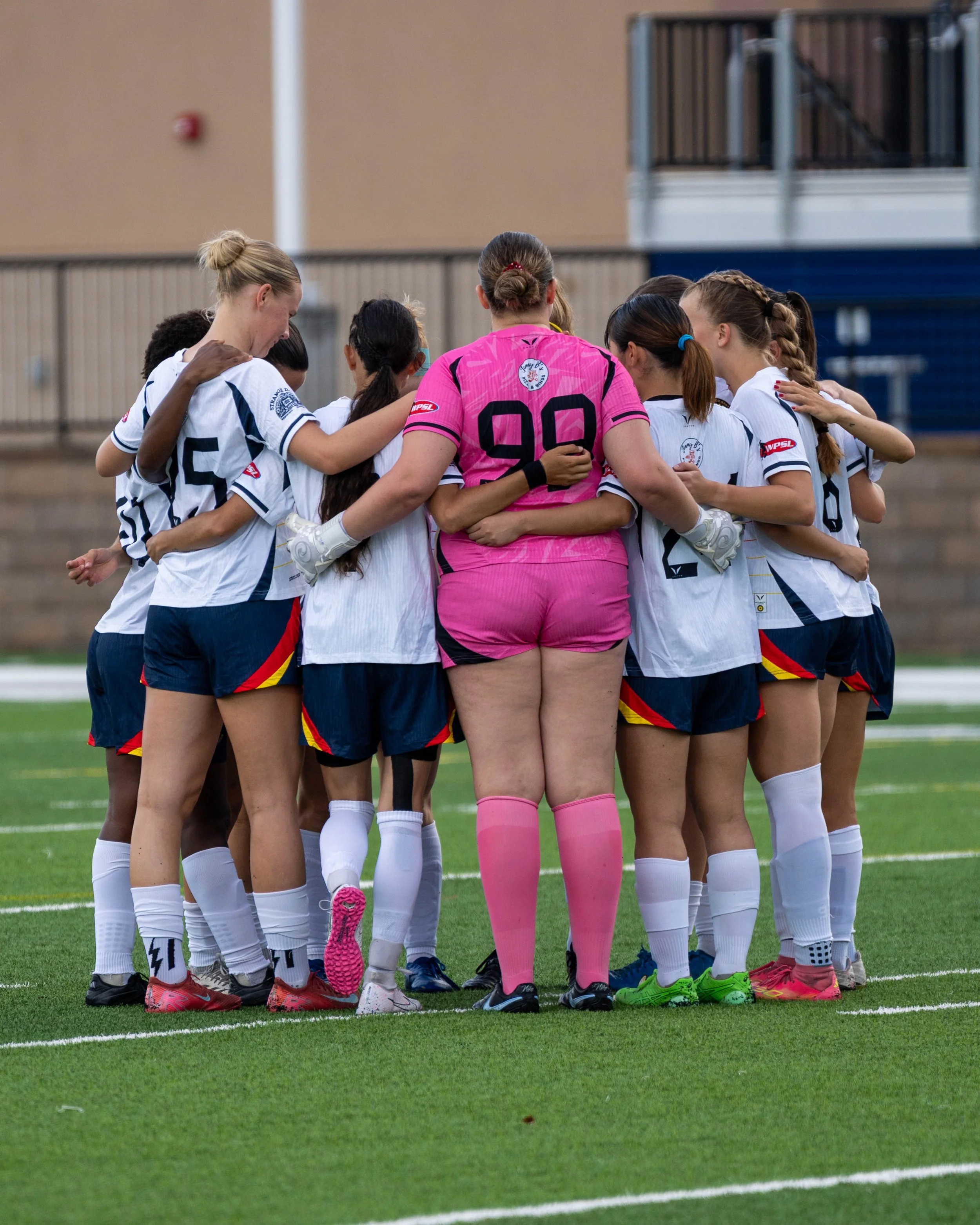 Sunflower State FC starters in a huddle at home vs Wichita FC on June 7th, 2026 - Photo by Austin Farrow