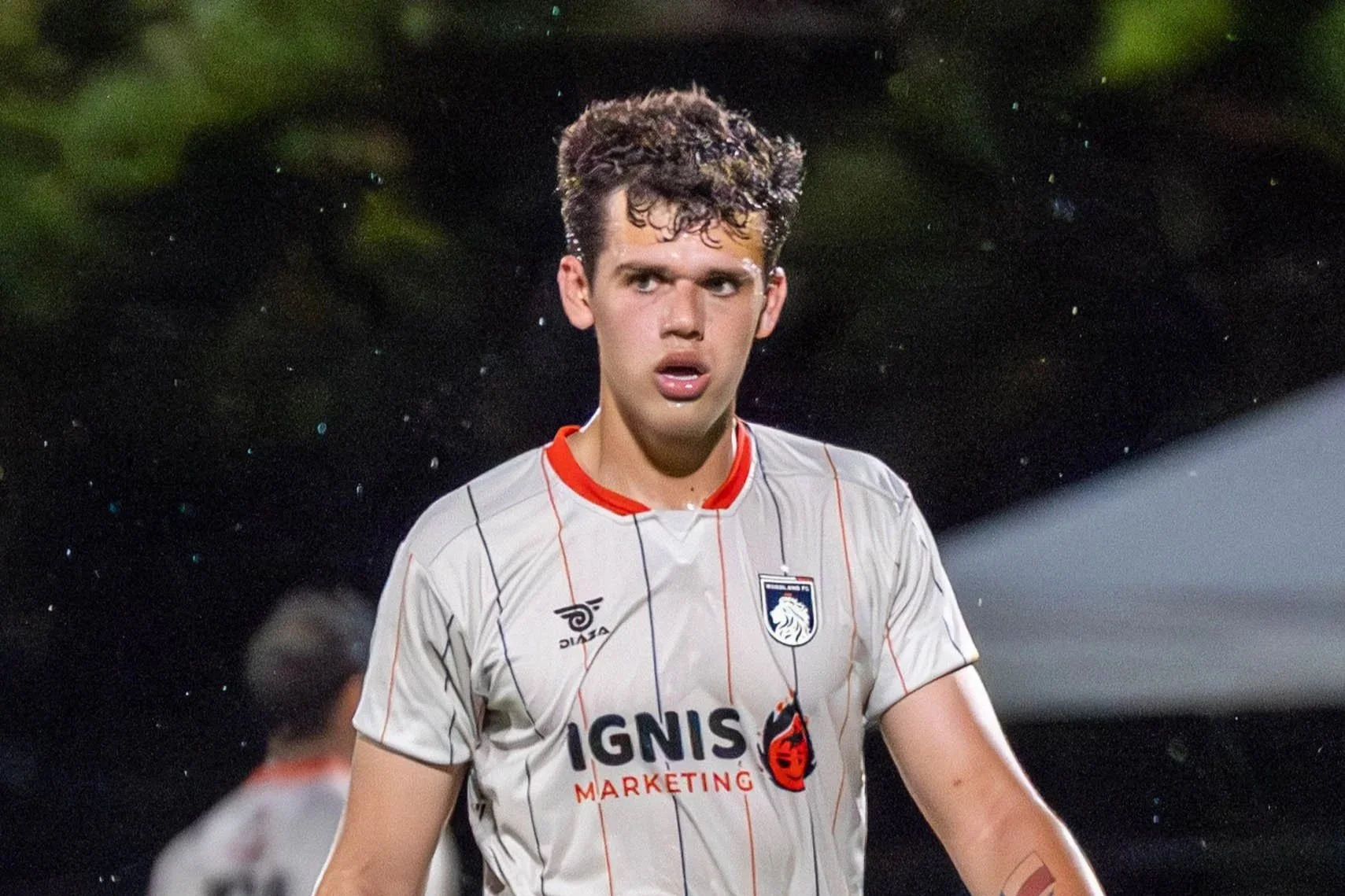 Woodland FC’s Nico Bair looks off towards the ball during a wet home match against Southside FC on June 6th, 2026