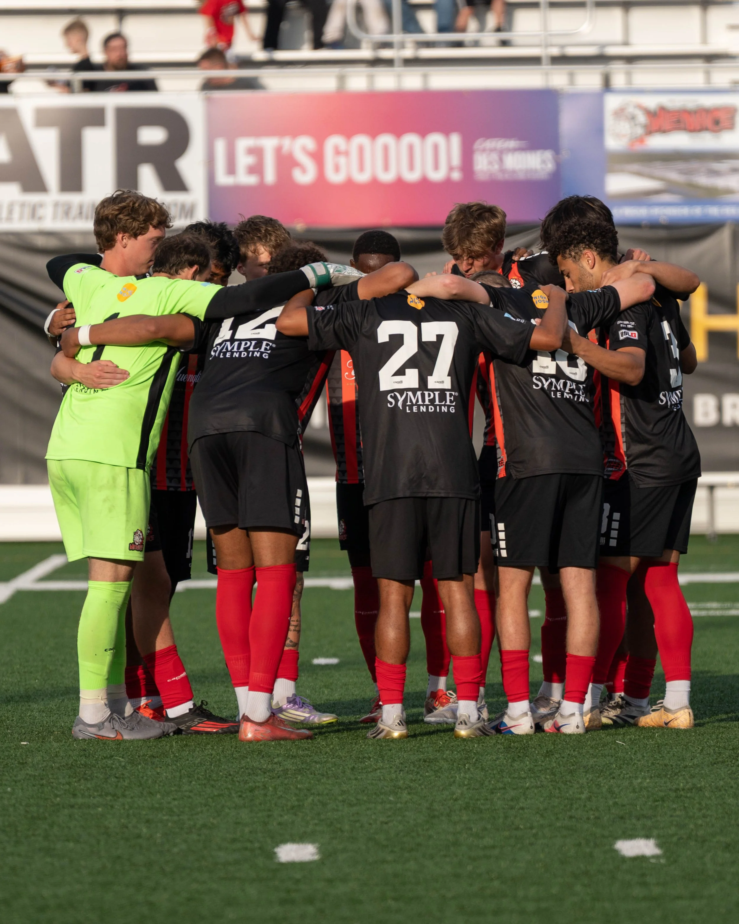 Des Moines Menace starters in a huddle at home against Sunflower State FC on May 30th, 2026 - Photo by: Austin Farrow