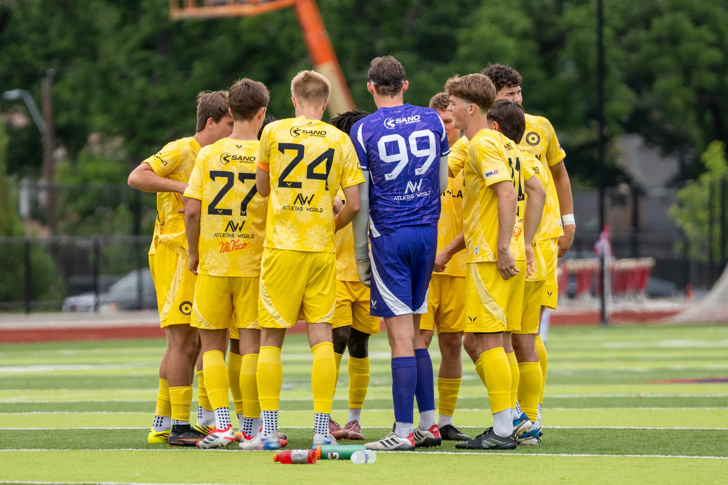 Sunflower State FC in a huddle during a home game against Springfield FC at The Pembroke Hill School on June 6th, 2026