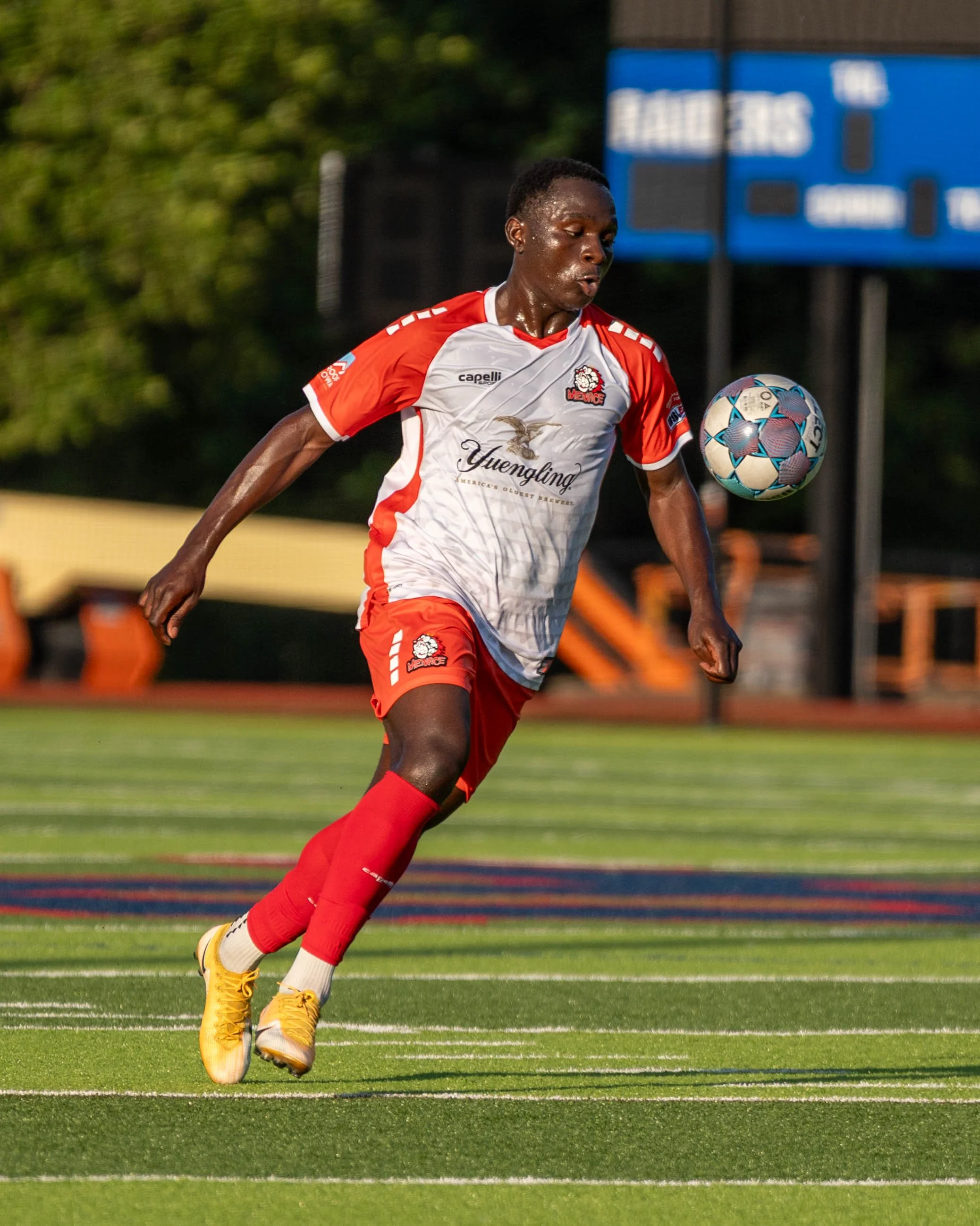 A Des Moines Menace player attempts to settle a ball on the road against Sunflower State FC on June 3rd, 2026 - Photo by: Austin Farrow