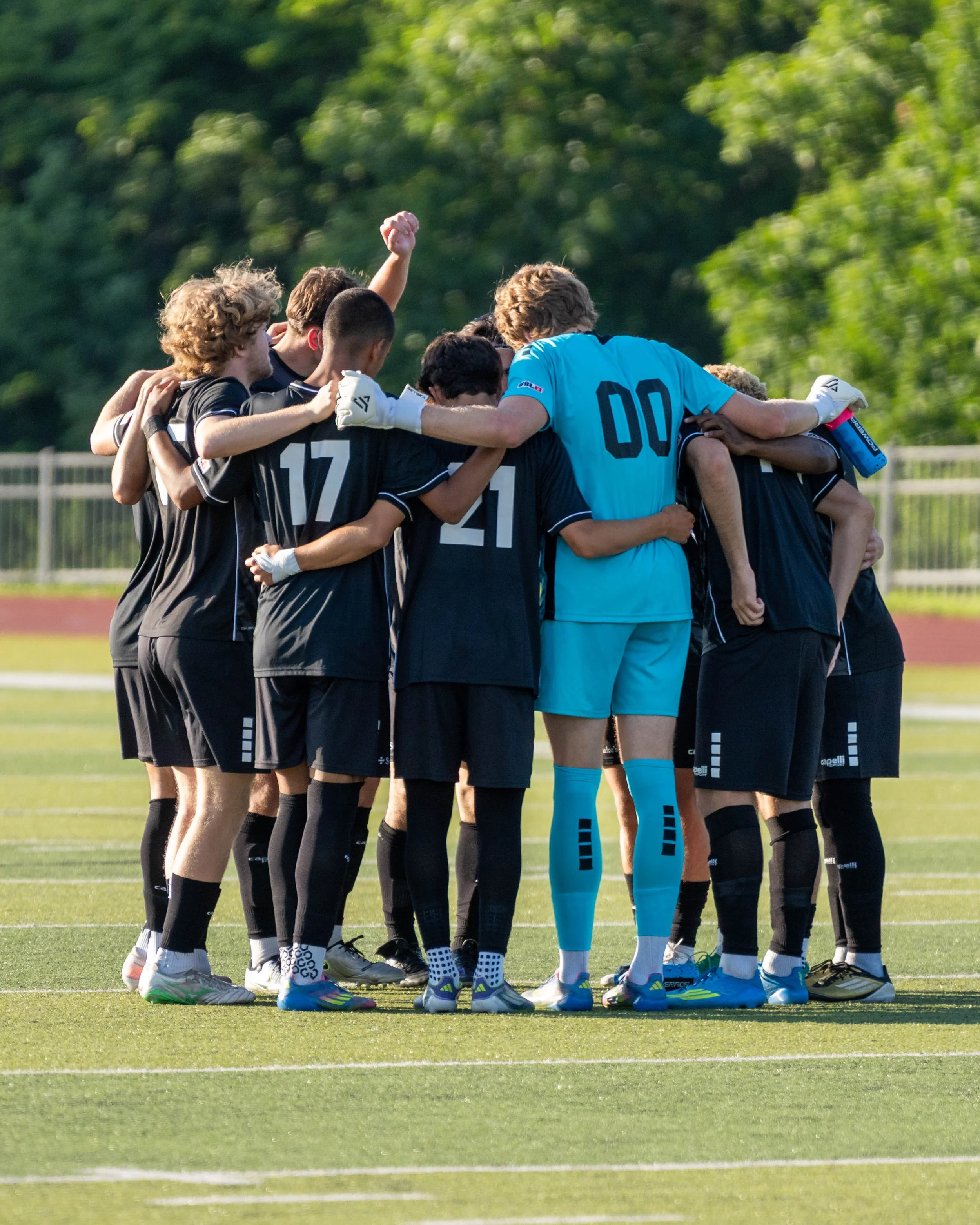 FC Ambush starters in a huddle at home against Sunflower State FC on June 13th, 2026 - Photo by: Austin Farrow