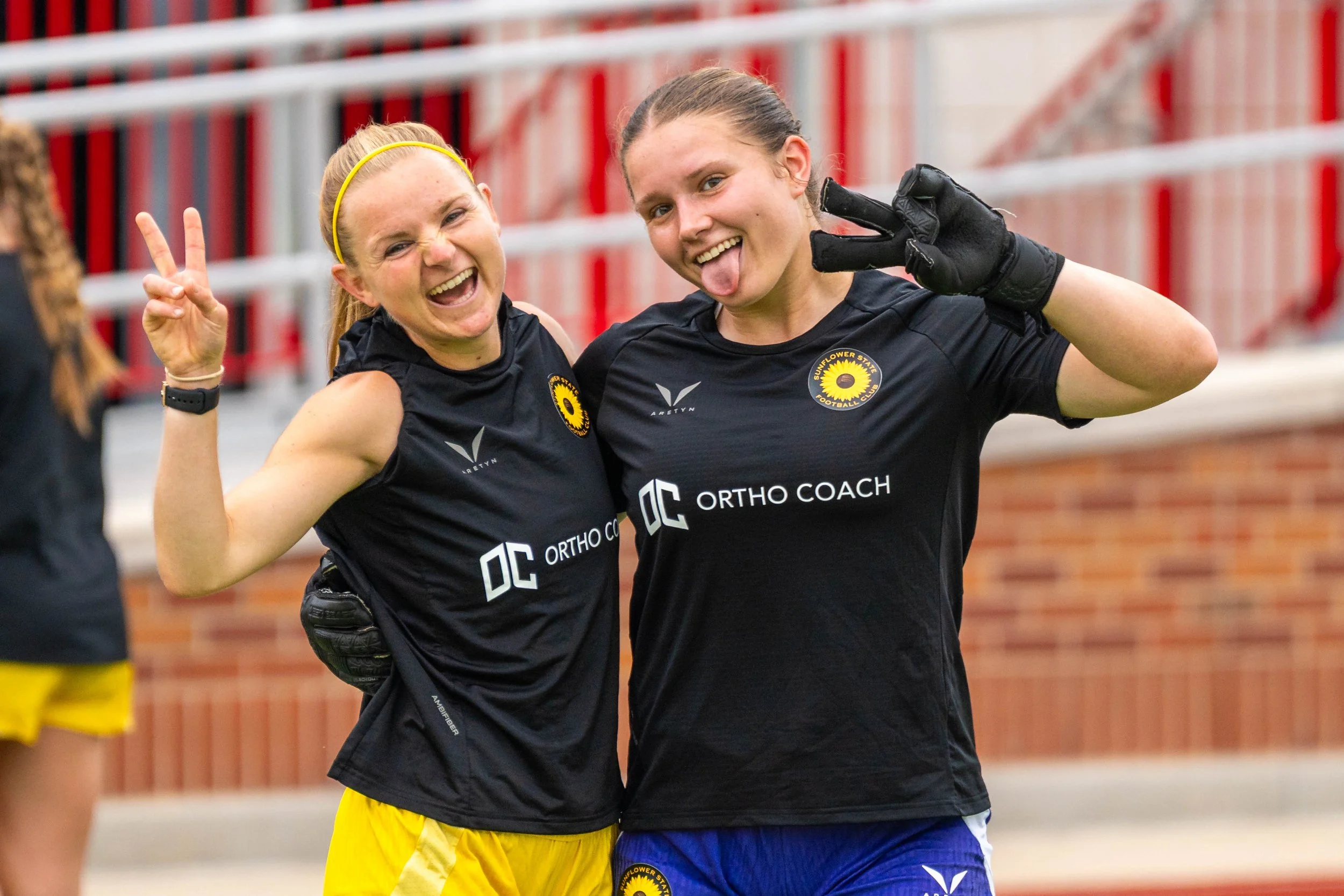 Sunflower State FC players posing for the camera while walking to the locker room from warmups at home vs Oklahoma City FC on June 6th, 2026 - Photo by: Austin Farrow