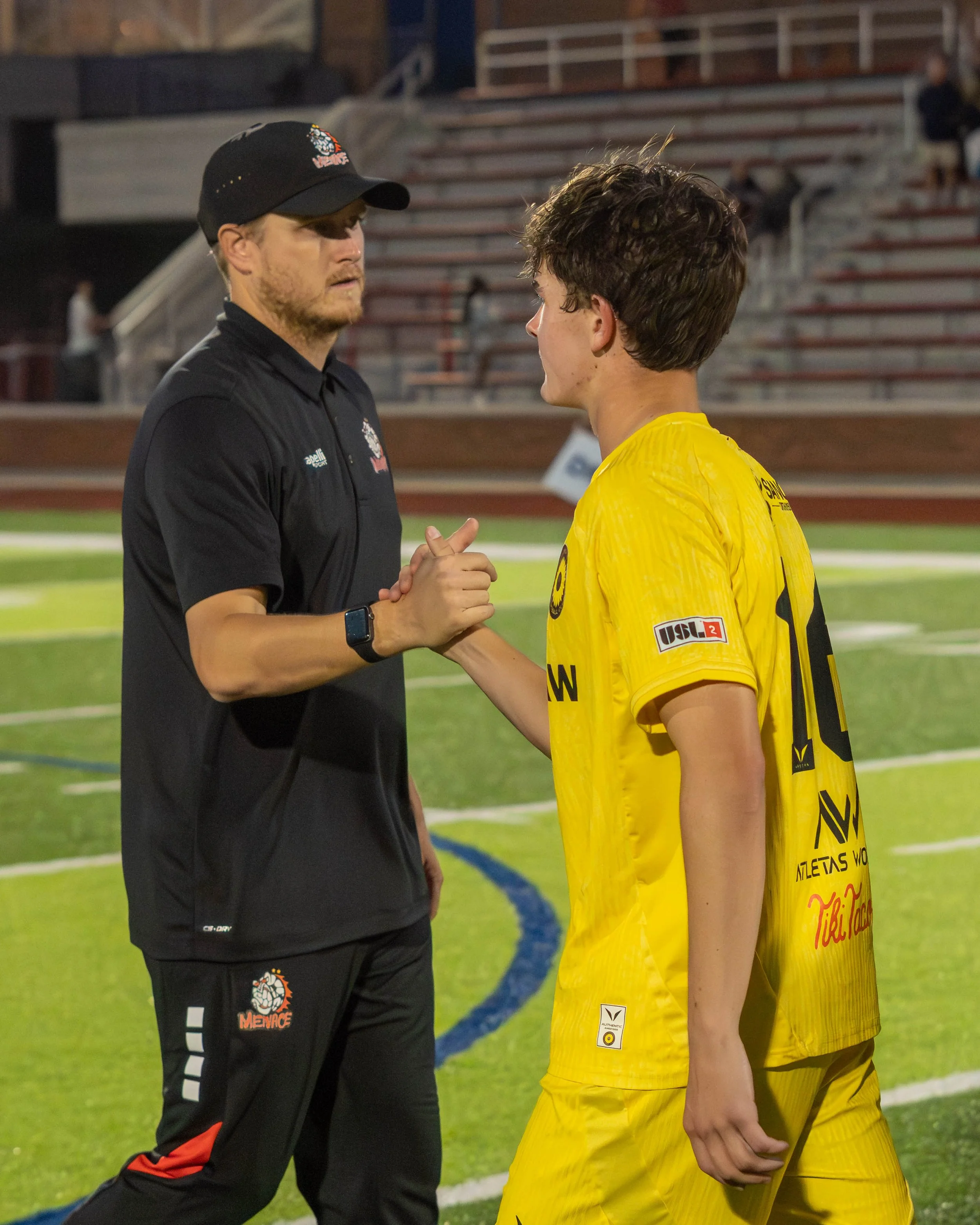 Des Moines Menace coach and a Sunflower State FC player shake hands at full time on June 3rd, 2026 - Photo by: Austin Farrow