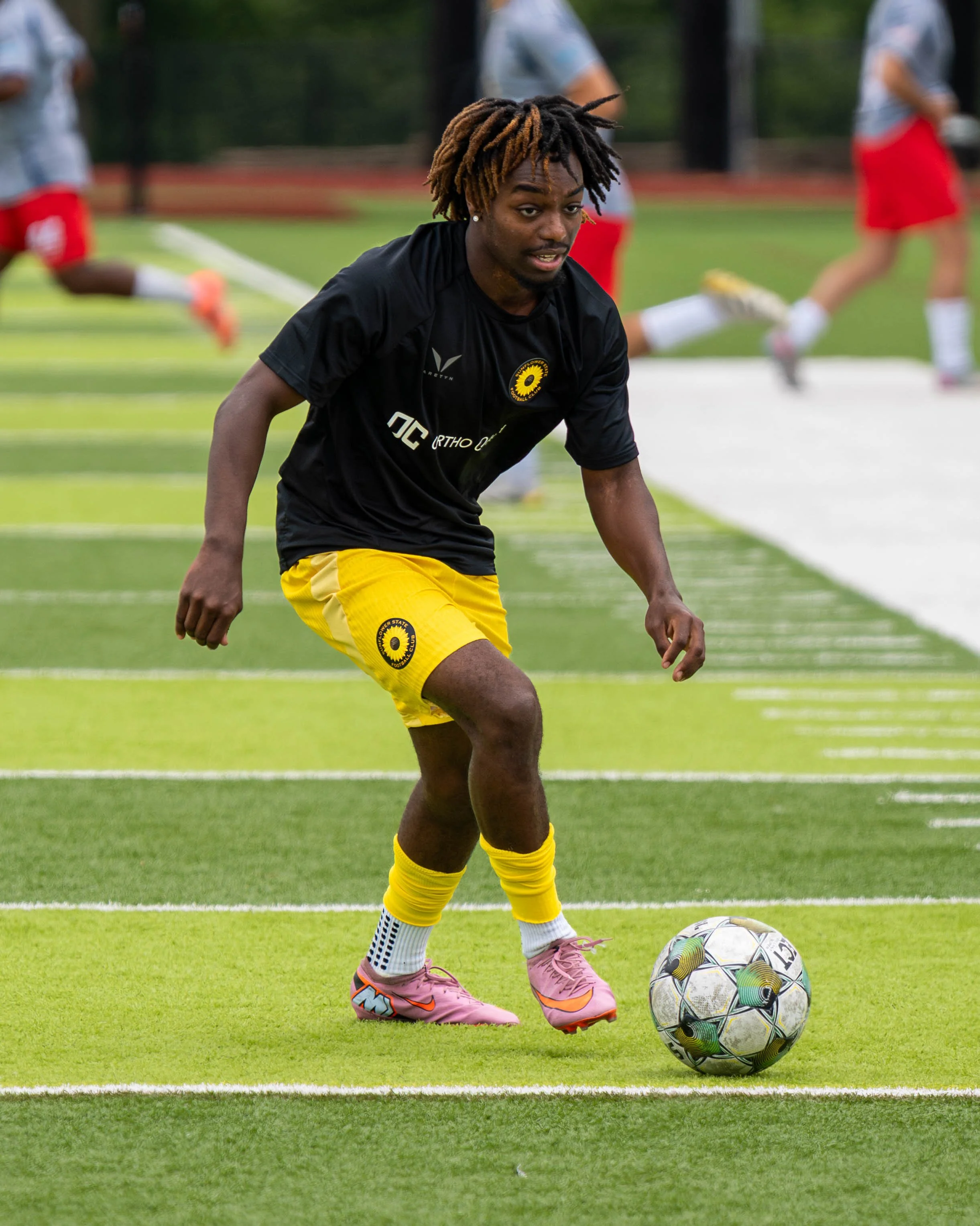A Sunflower State FC player dribbles during warmups on June 6th, 2026 - Photo by: Austin Farrow