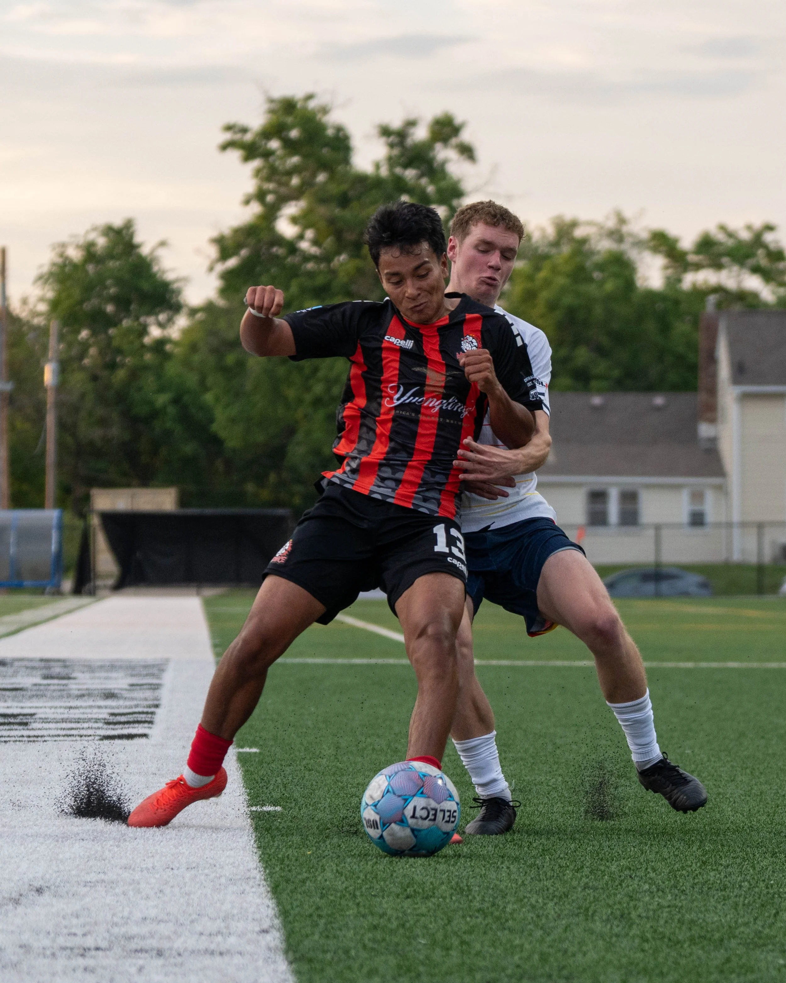 Des Moines Menace player shields the ball from an oncoming opponent at home against Sunflower State FC on May 30th, 2026 - Photo by: Austin Farrow