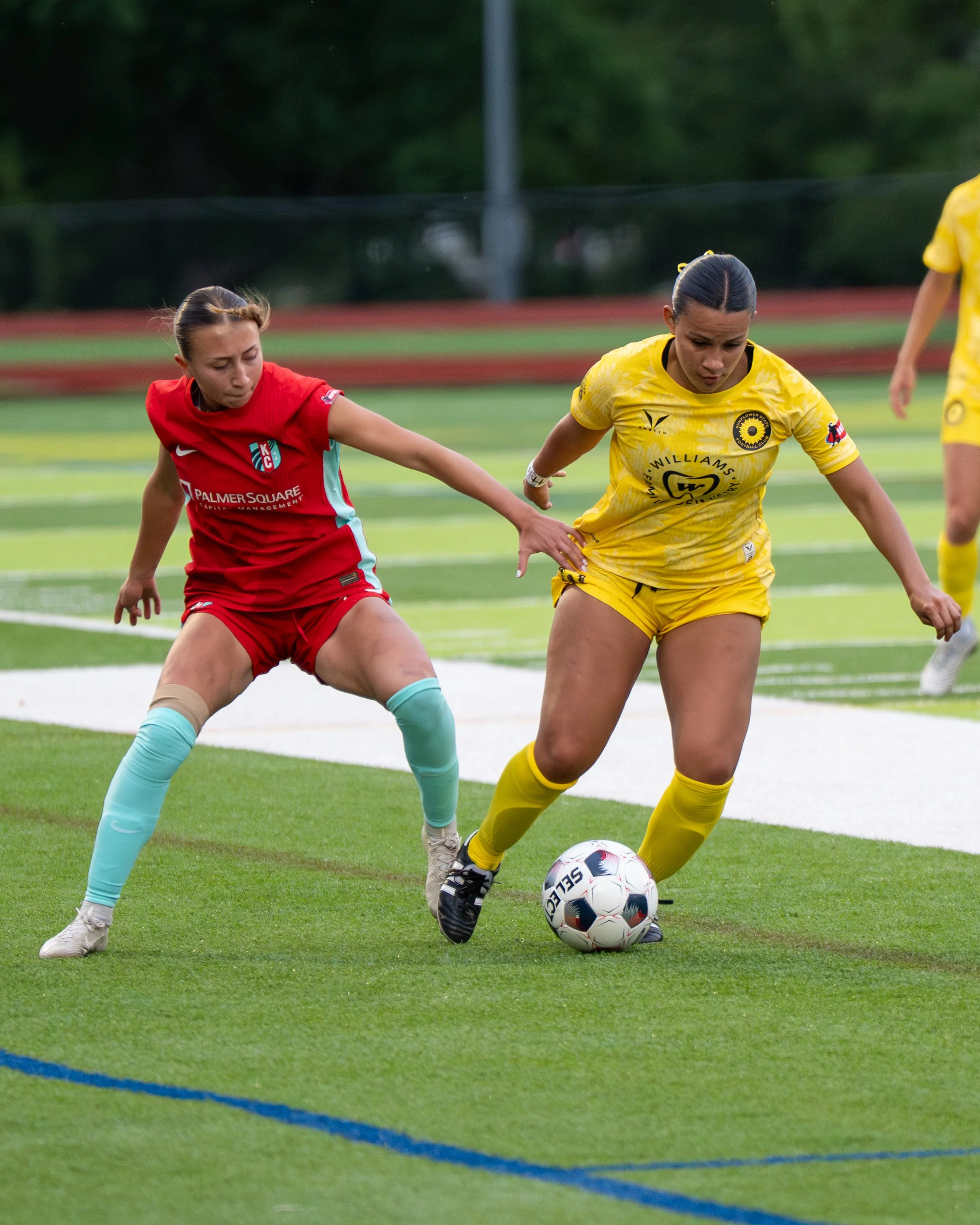 Sunflower State FC's Ximena Arnau dribbles past a KC Current II player on May 20th, 2026 - Photo by: Austin Farrow