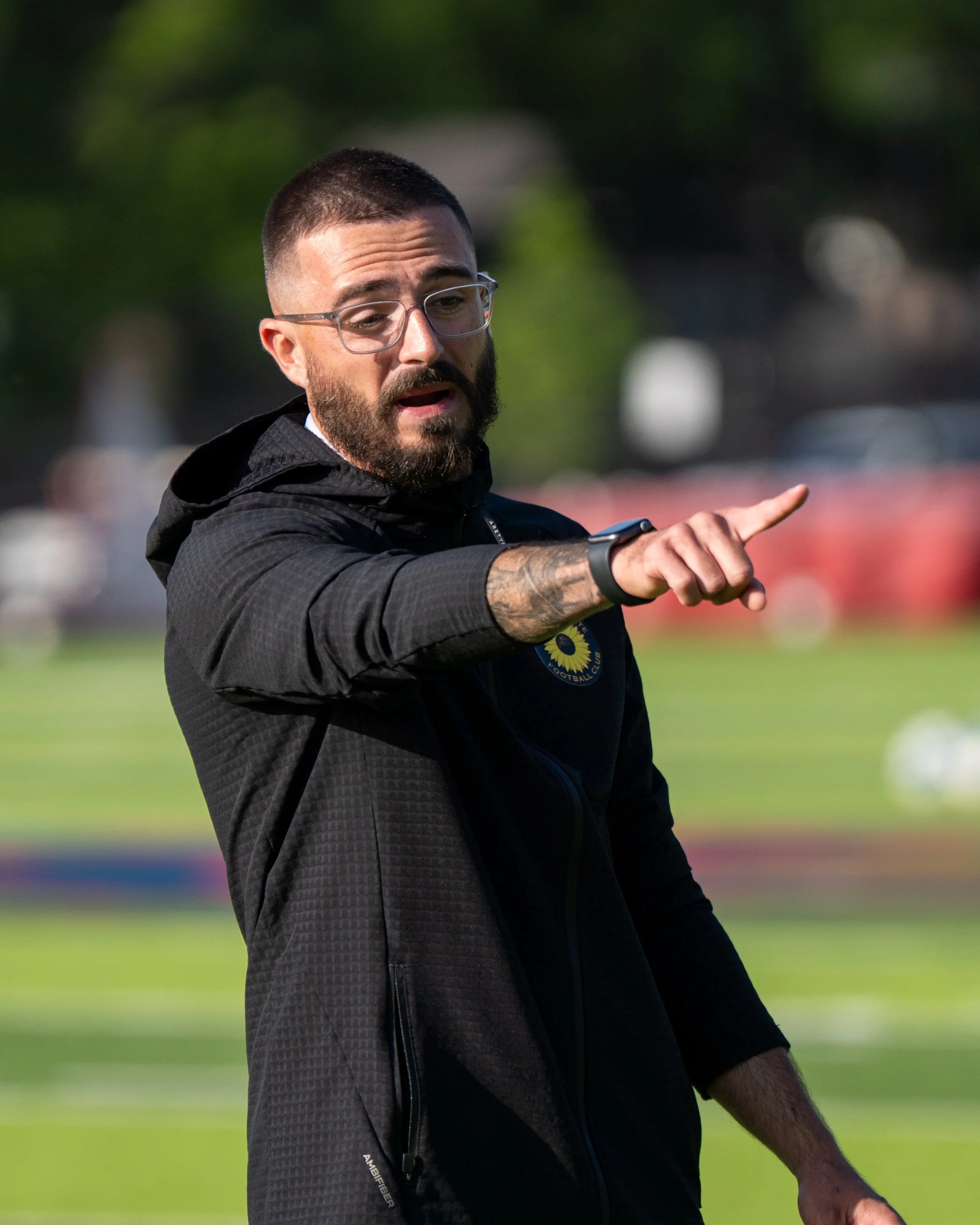 Sunflower State FC coach Jose Ramos pointing during warmups at home against KC Current II on May 20th, 2026  - Photo by: Austin Farrow