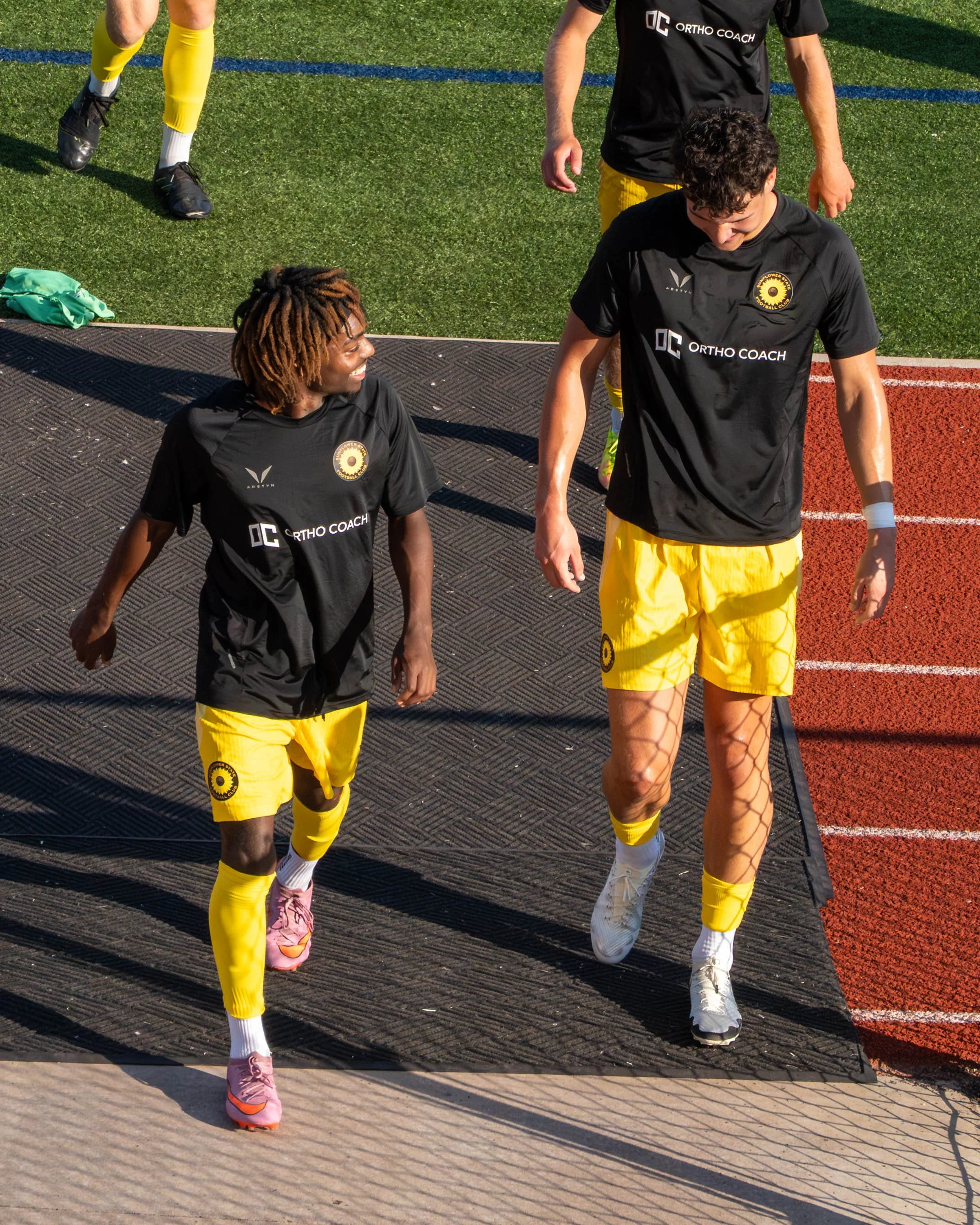 Two Sunflower State FC walking into the locker rooms after warmups at home against Des Moines Menace on June 3rd, 2026 - Photo by: Austin Farrow