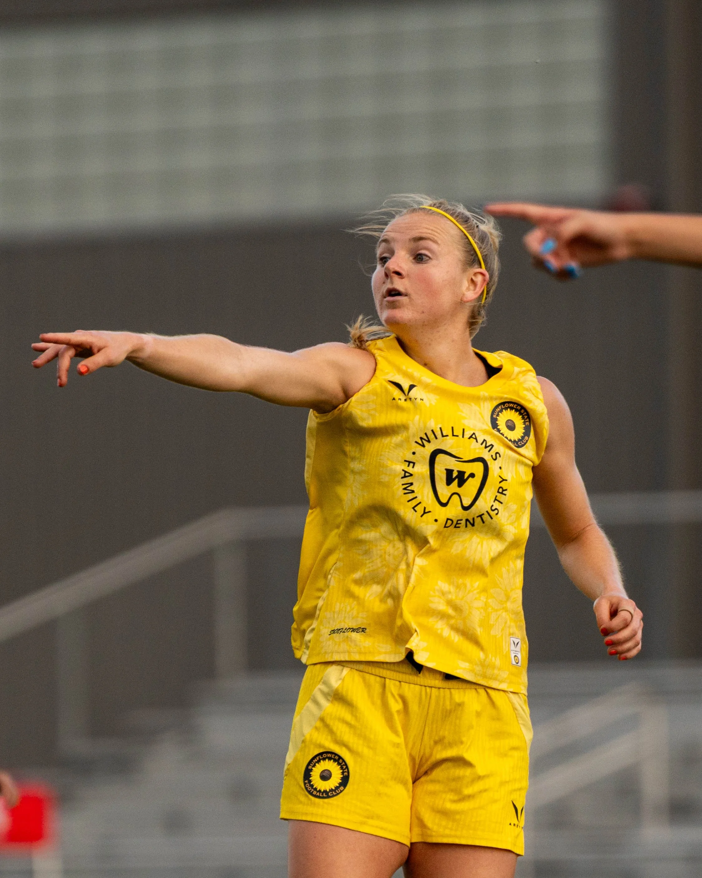 Sunflower State FC’s Alexis Mitchell points instruction to her teamate on the road against FC Wichita on June 10th, 2026 - Photo by: Austin Farrow