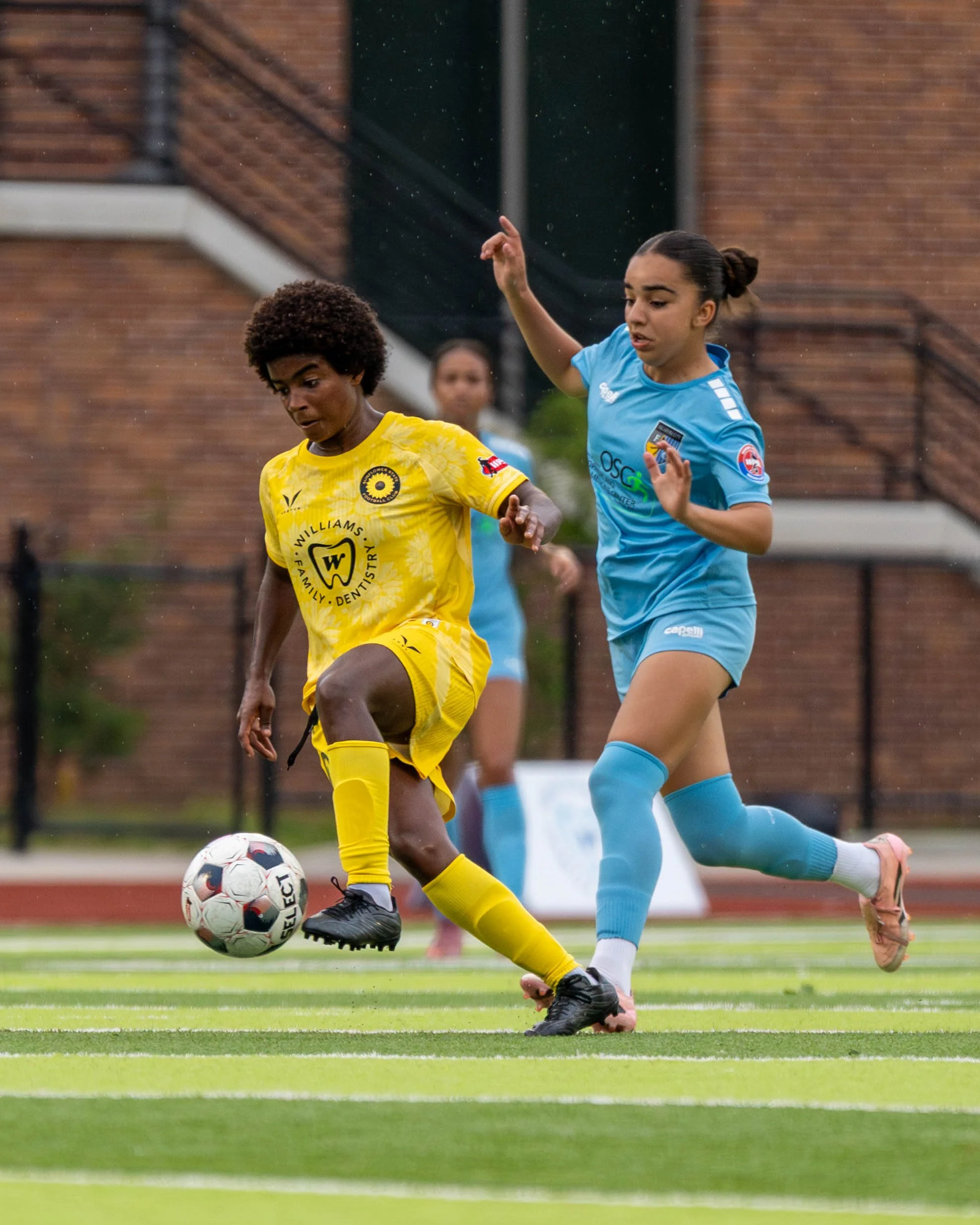 Sunflower State FC's Tata (#10) trying to control the ball with a Oklahoma City FC player on her back at home on June 6th, 2026 - Photo by: Austin Farrow