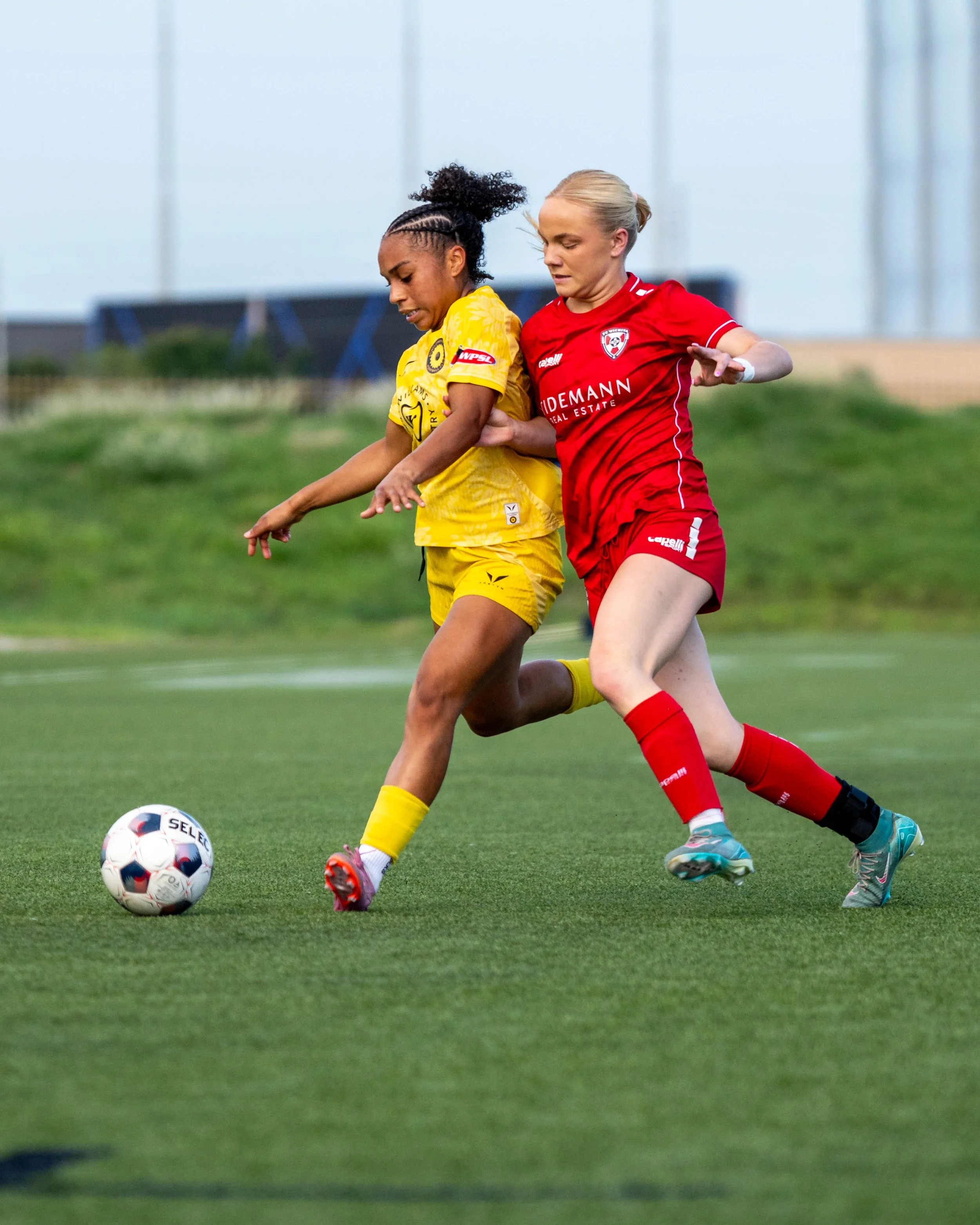 Sunflower State FC's Luna Tiene shields the ball from an opponent on the road vs Wichita FC on June 10th, 2026 - Photo by Austin Farrow