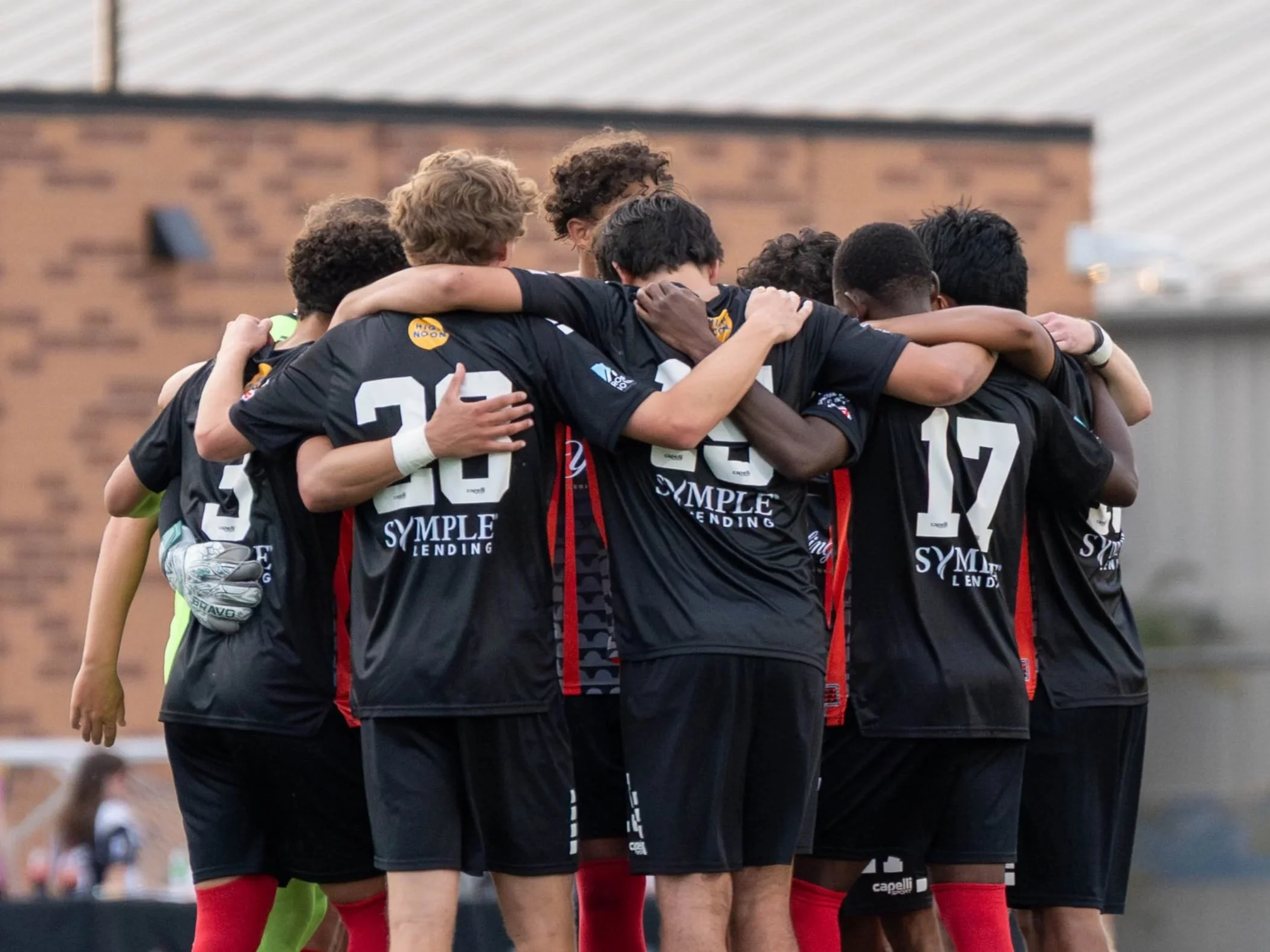 Des Moines Menace in a huddle during a home match agsinst Sunflower State FC at Mediacom Stadium on May 30th. 2026