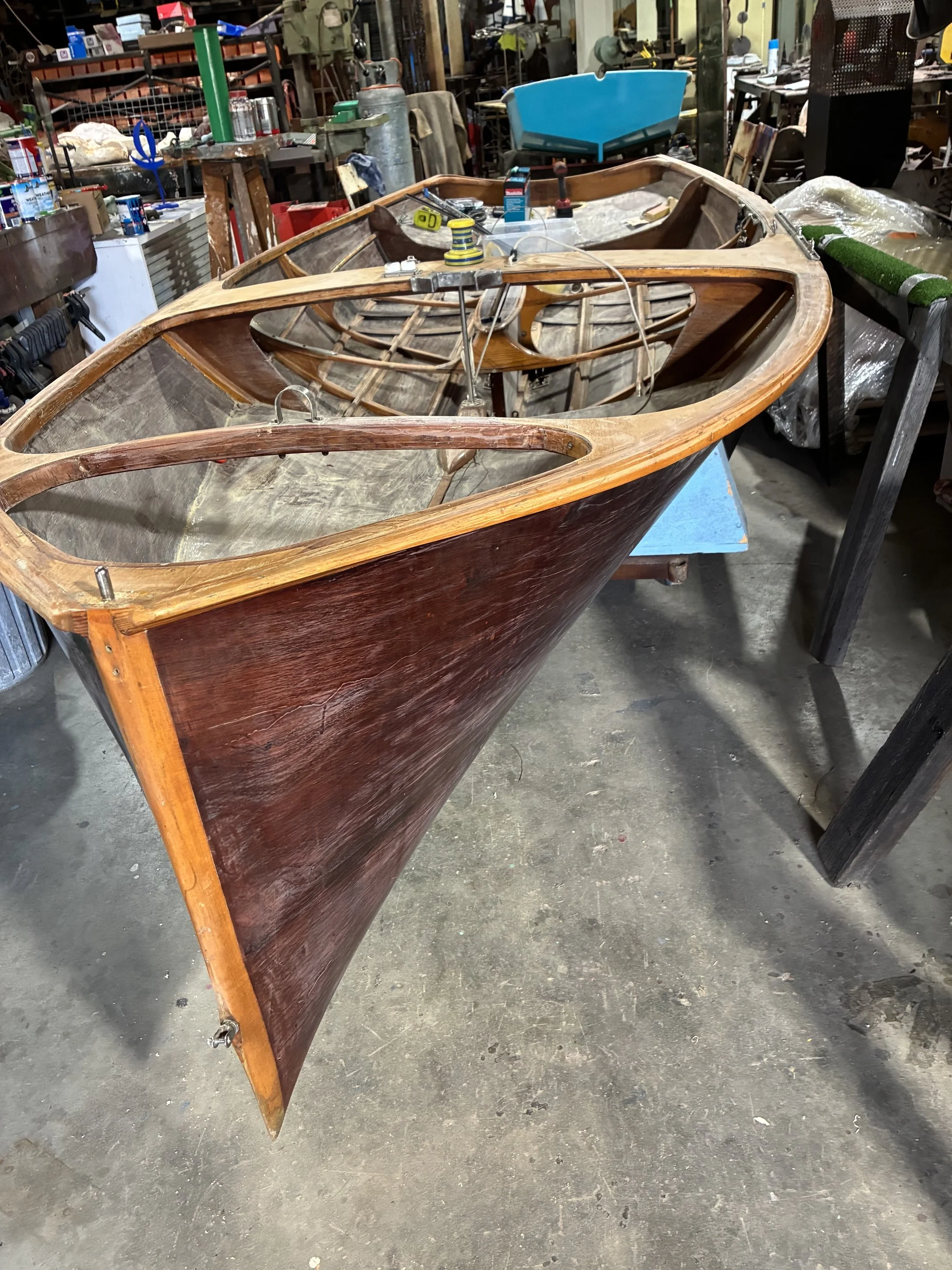 The 16ft skiff 'Michelle' undergoing renovation in the Swan River Sailing Dinghy Heritage Association workshop.