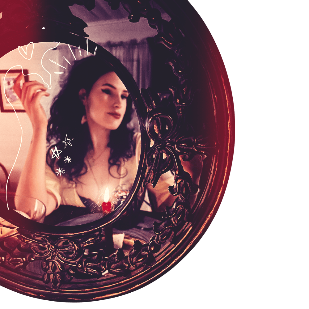 A woman with dark curly hair looking at her reflection in an ornate vintage hand mirror. The mirror has decorative embellishments around its frame, and there are small doodle-like stars and hearts overlaid on the image.