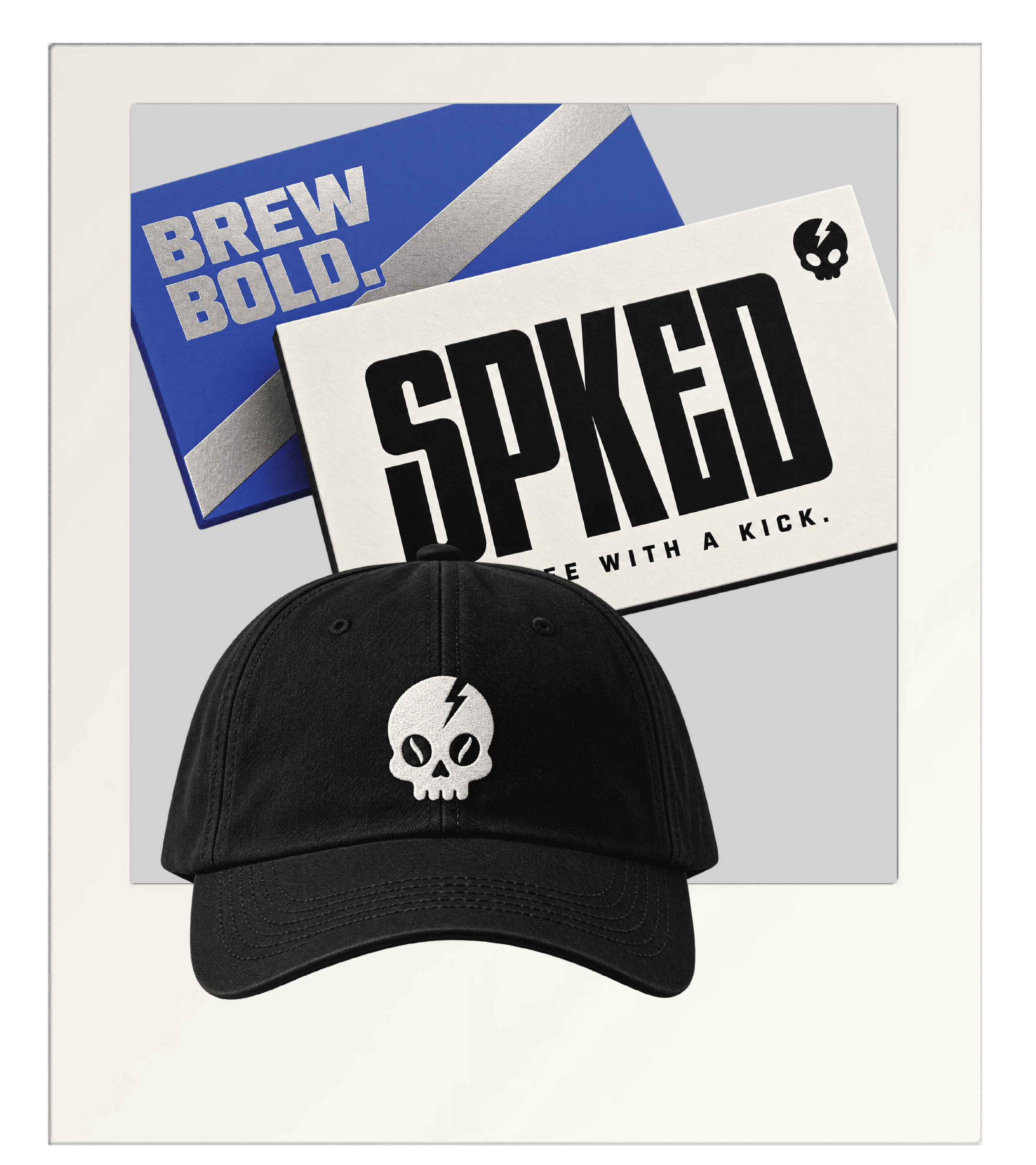 spked branding on business cards and black hat stitched with skull icon