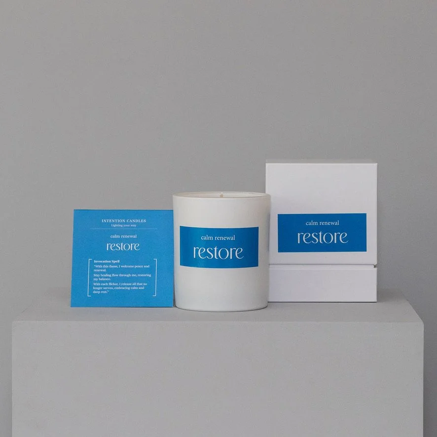 Rescue skincare products including a jar and boxes on a white surface