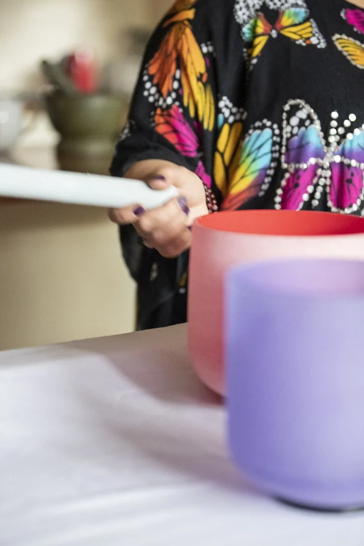 Crystal singing bowls used in Maria Davis's energy healing practice