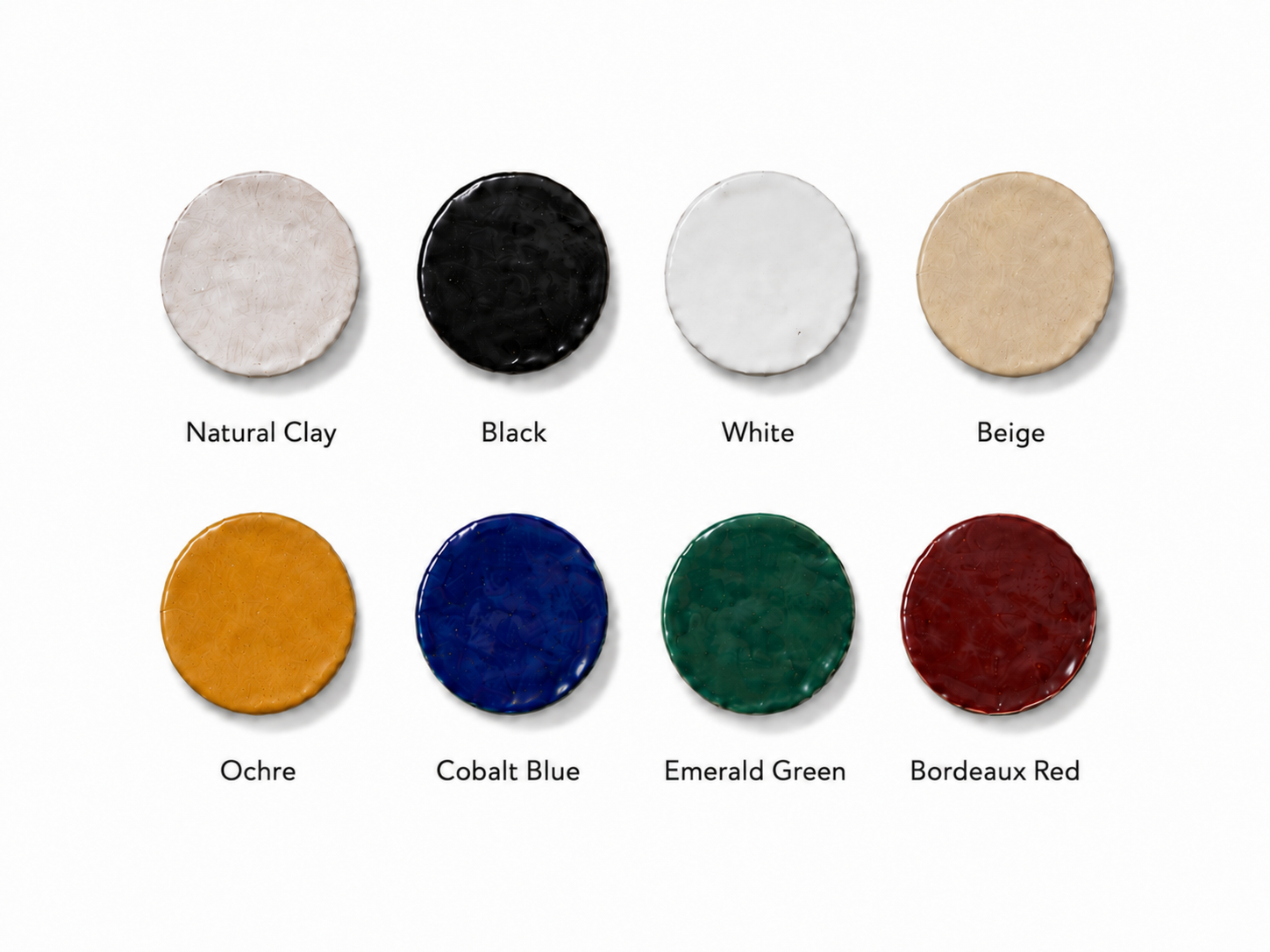 Eight color samples of crafting clay arranged in two rows. Top row from left to right: natural clay, black, white, beige. Bottom row from left to right: ochre, cobalt blue, emerald green, bordeaux red.
