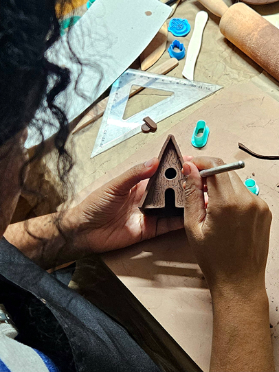 person crafting unique and handmade jewlries and accessories