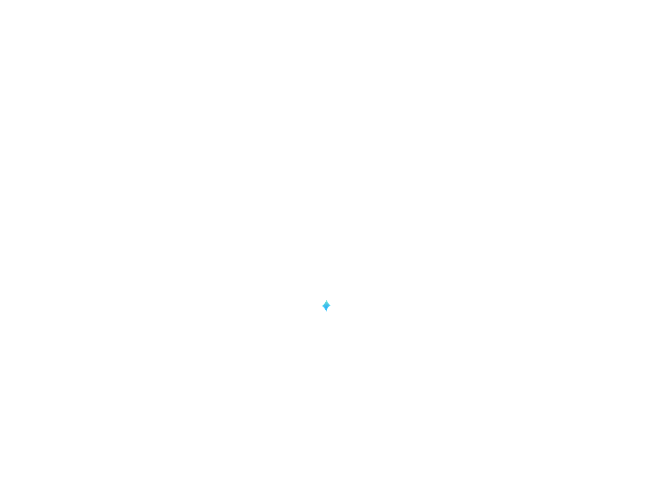 A blank white background with a small blue diamond-shaped icon at the center.