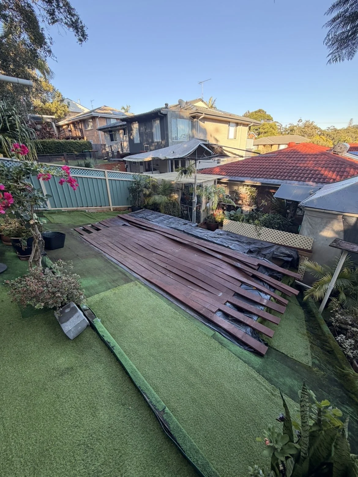 Before picture of what's going to be a custom Murbau deck, stairs, bench and picket hand railings. Using extreme h4 treated pine framing that is built to last.
