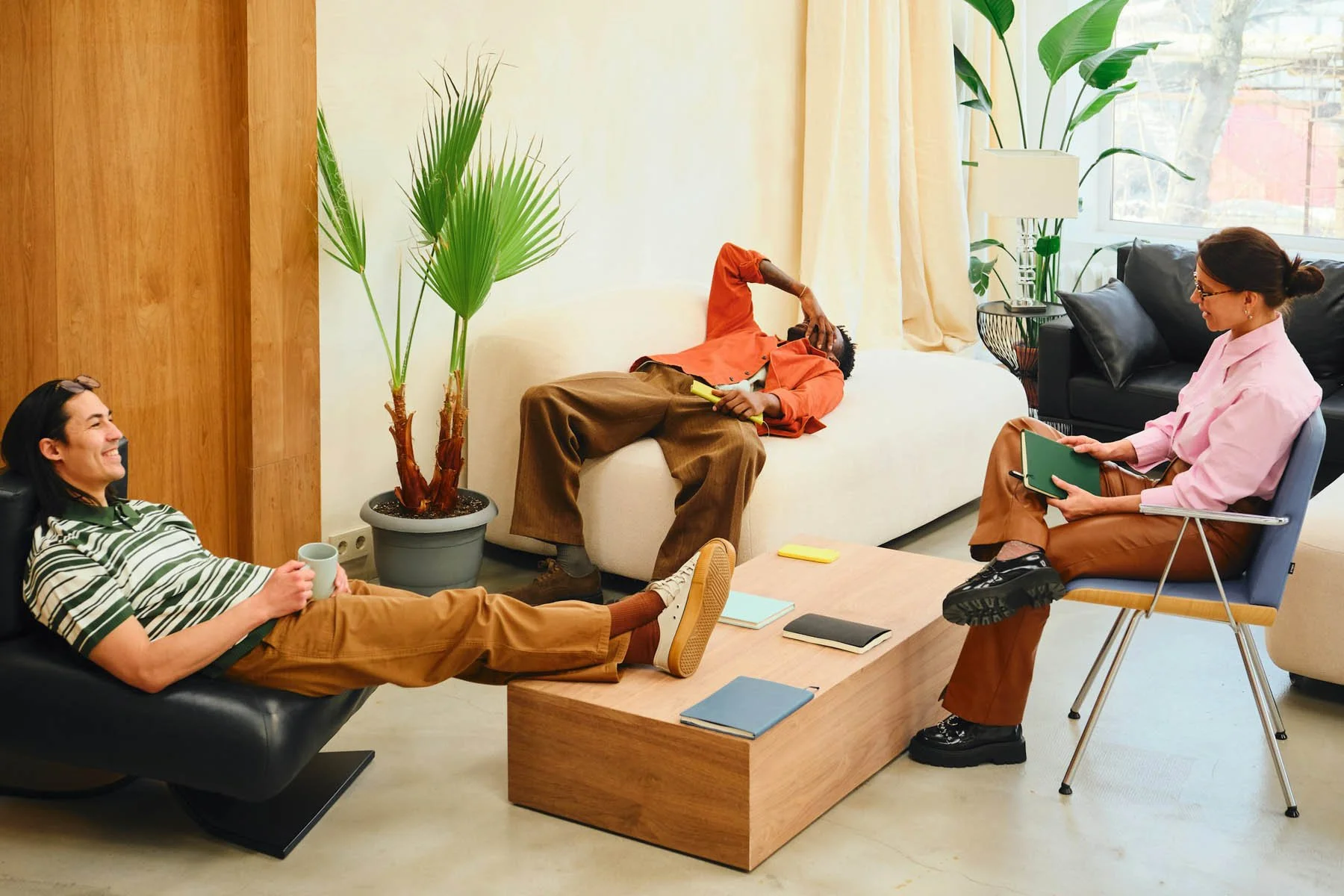 A group of people in a bright, modern room.