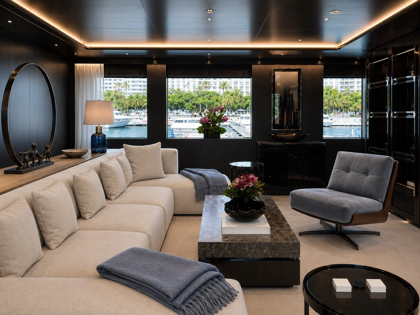 Upper lounge. Lighting, furniture, window treatments, styling — the residential feel of the vessel carried upward.