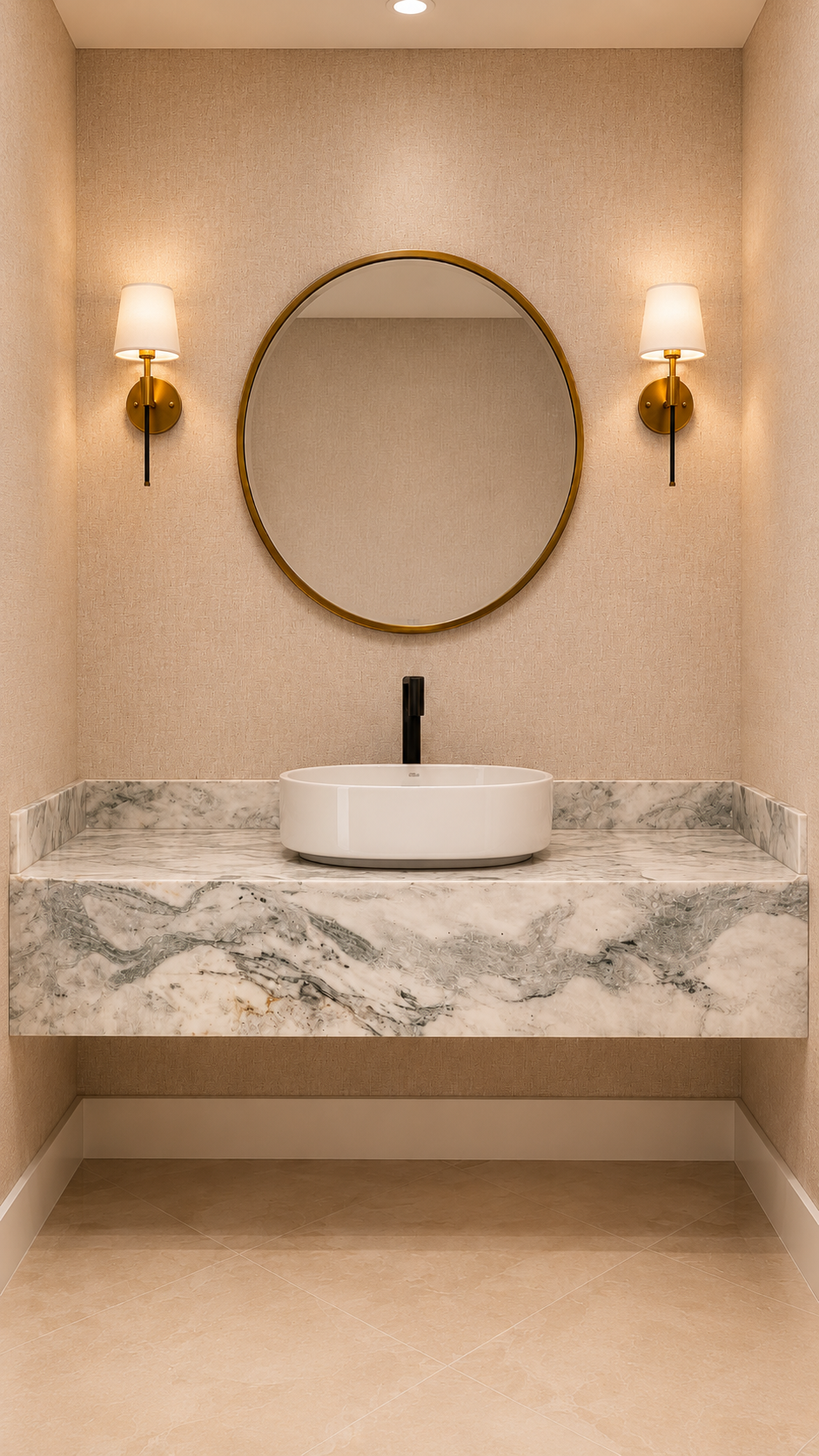 Modern bathroom vanity with a marble countertop, oval mirror, and two wall-mounted sconces with white shades.