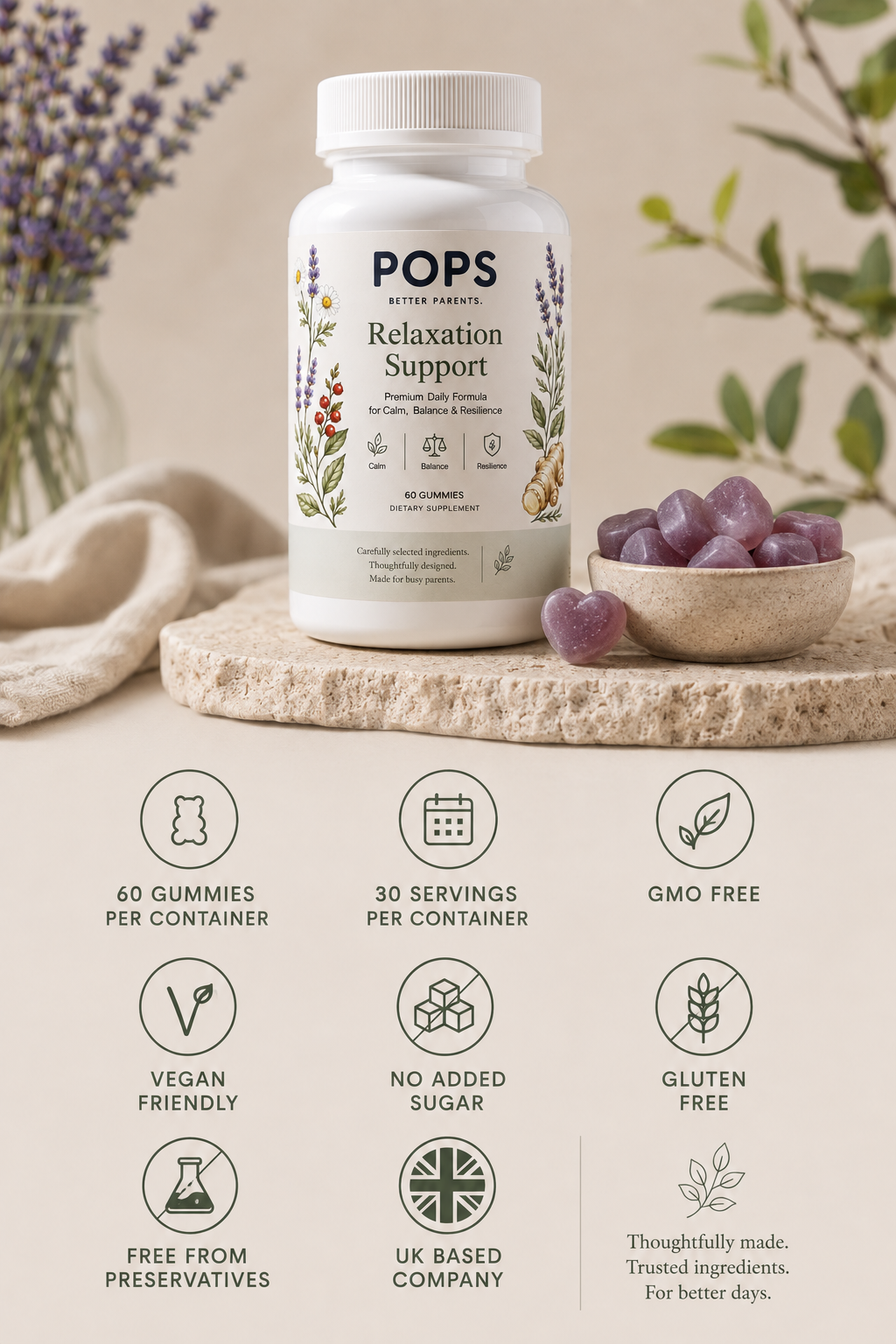 Bottle of POPS Relaxation Support gummies with lavender and ginger illustrations, surrounded by purple gummies and greenery on a neutral background.