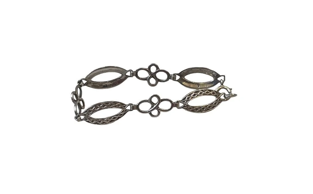vintage-jewellery-mid-century-celtic-sterling-silver-bracelet-1.jpg