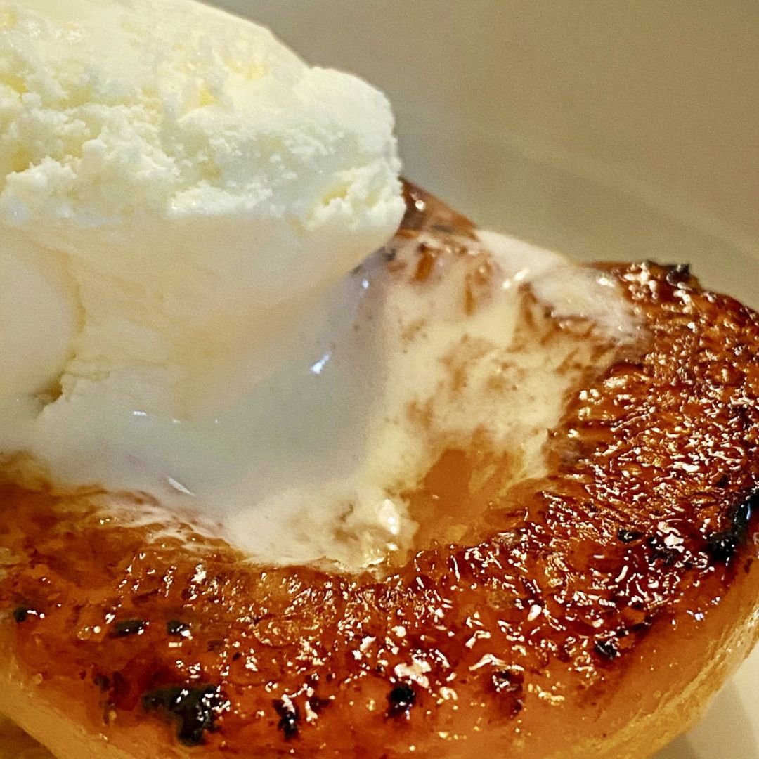 Grill peaches and add ice cream
