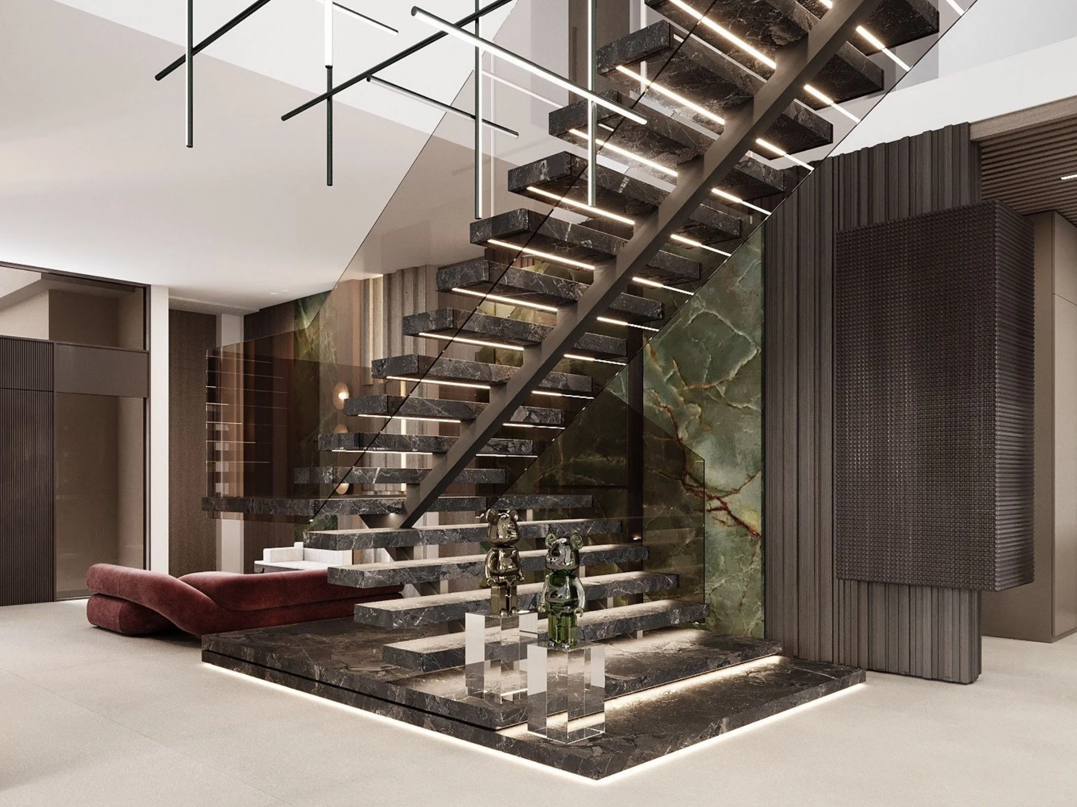 Modern staircase with black marble steps and built-in lighting, against a wall with green and beige marble accents, in a contemporary home interior.