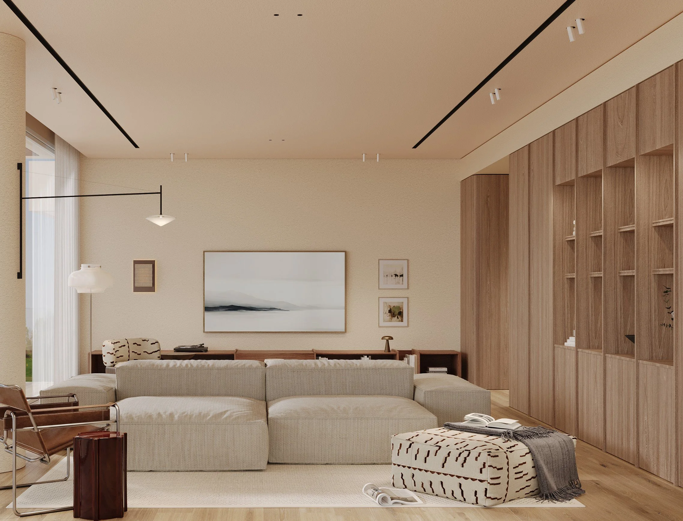 Modern living room with beige sectional sofa, armchair with black and white patterns, and wooden built-in shelves.